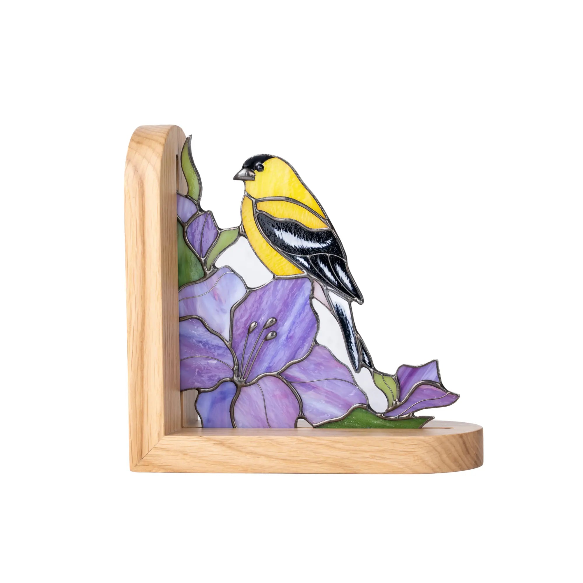 Stained glass bookend panel with goldfinch sitting on a purple flowers