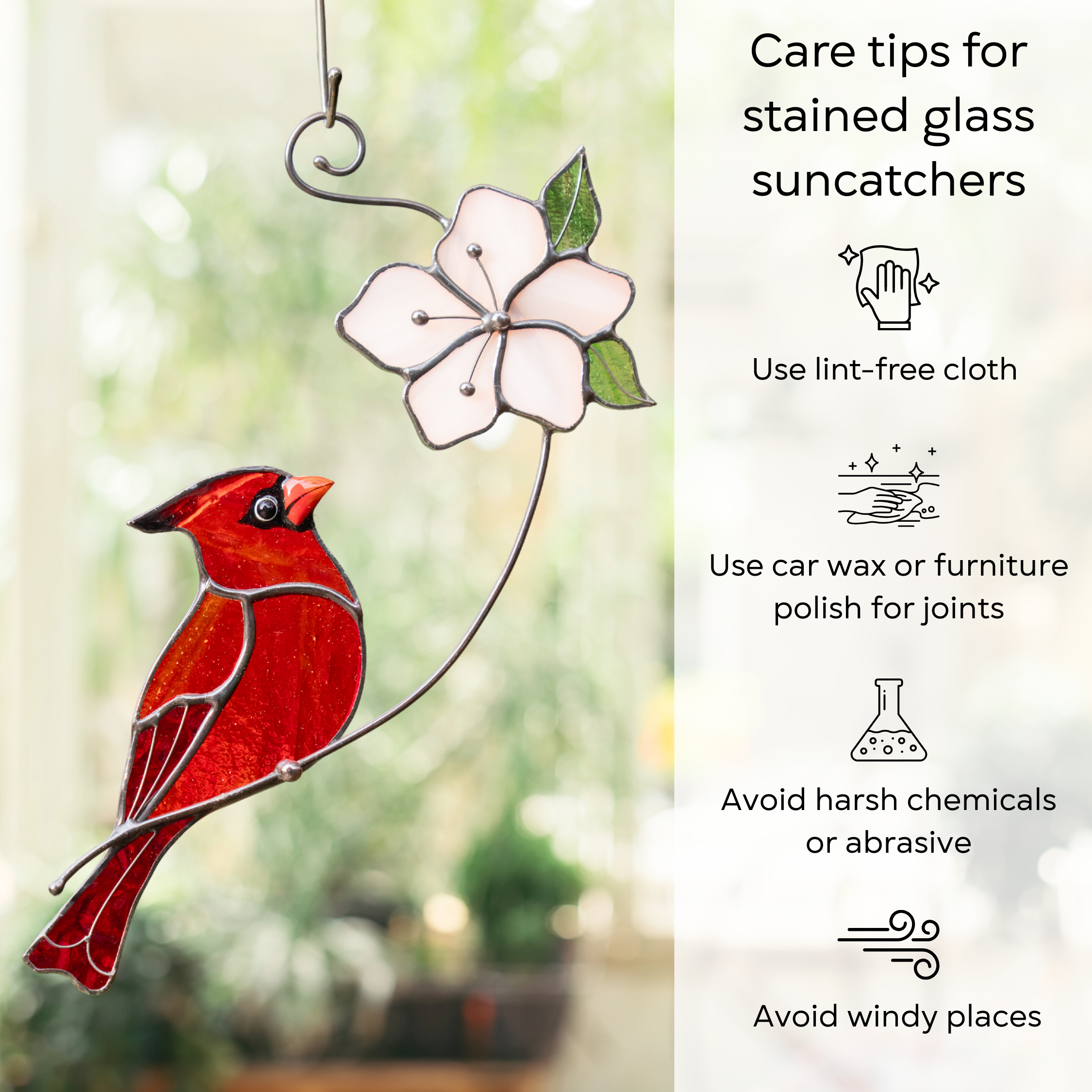 Hanging stained glass cardinal with pink flower next to care instructions for suncatchers: use lint-free cloth, use wax polish for joints, no harsh cleaners, avoid wind.