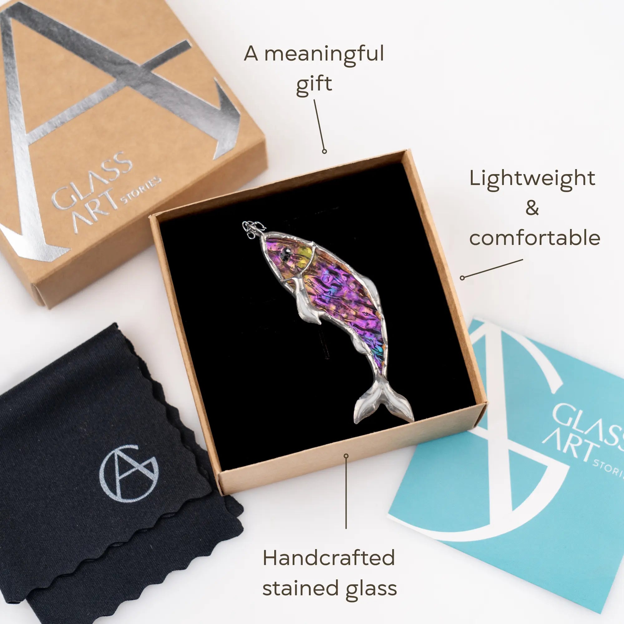 Handcrafted stained glass fish pendant in a box with 'Glass Art Studio' branding.