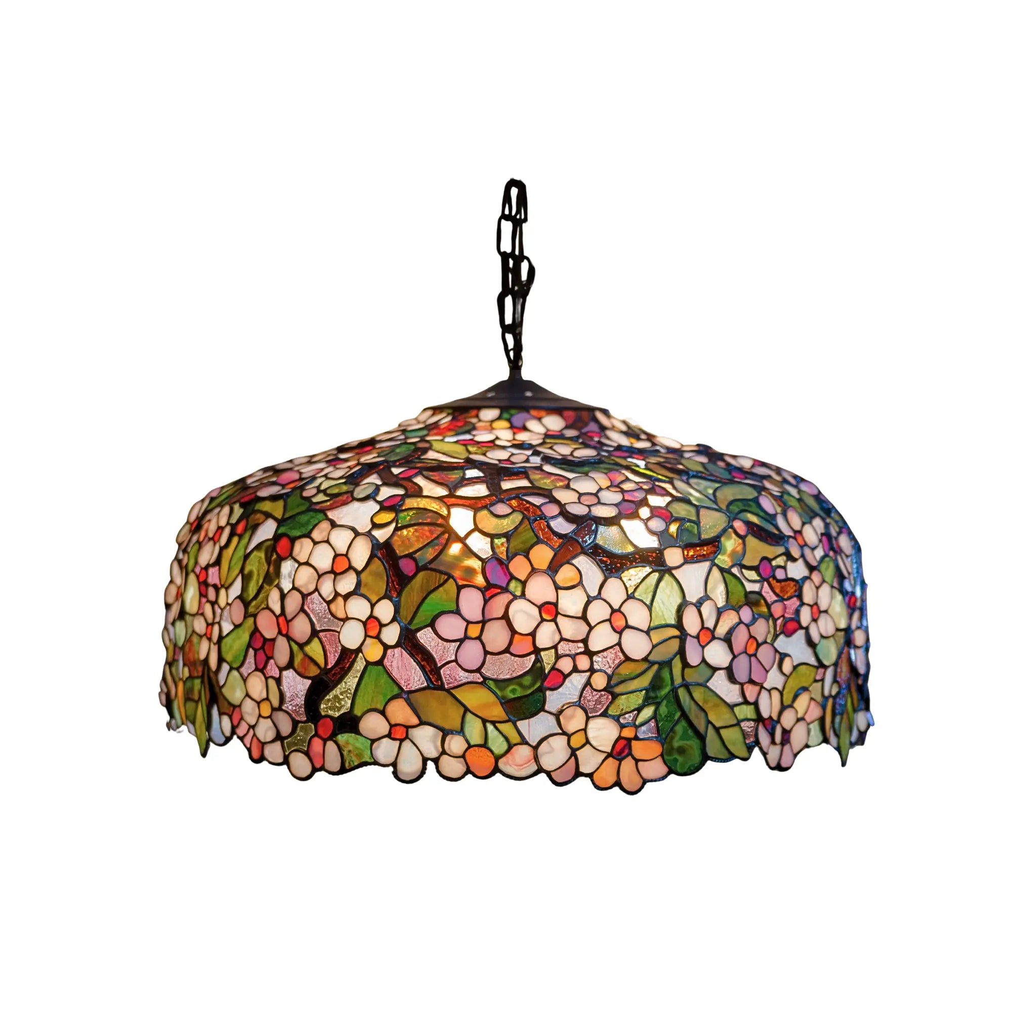 Dome-shaped stained glass chandelier shade with intricate floral pattern in white, pink, and green tones.