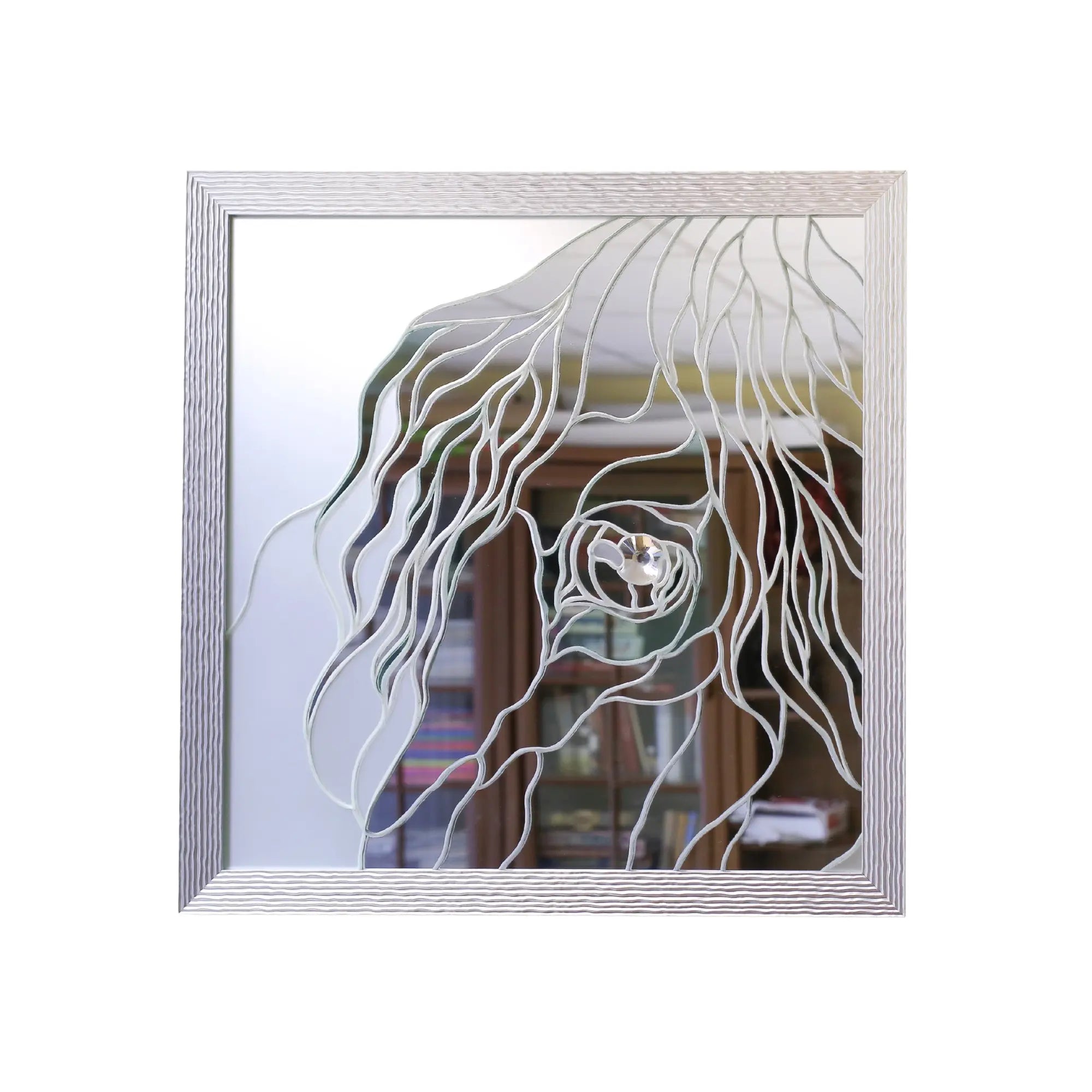 Mirror art featuring stained glass horse eye with flowing lines and textured silver frame