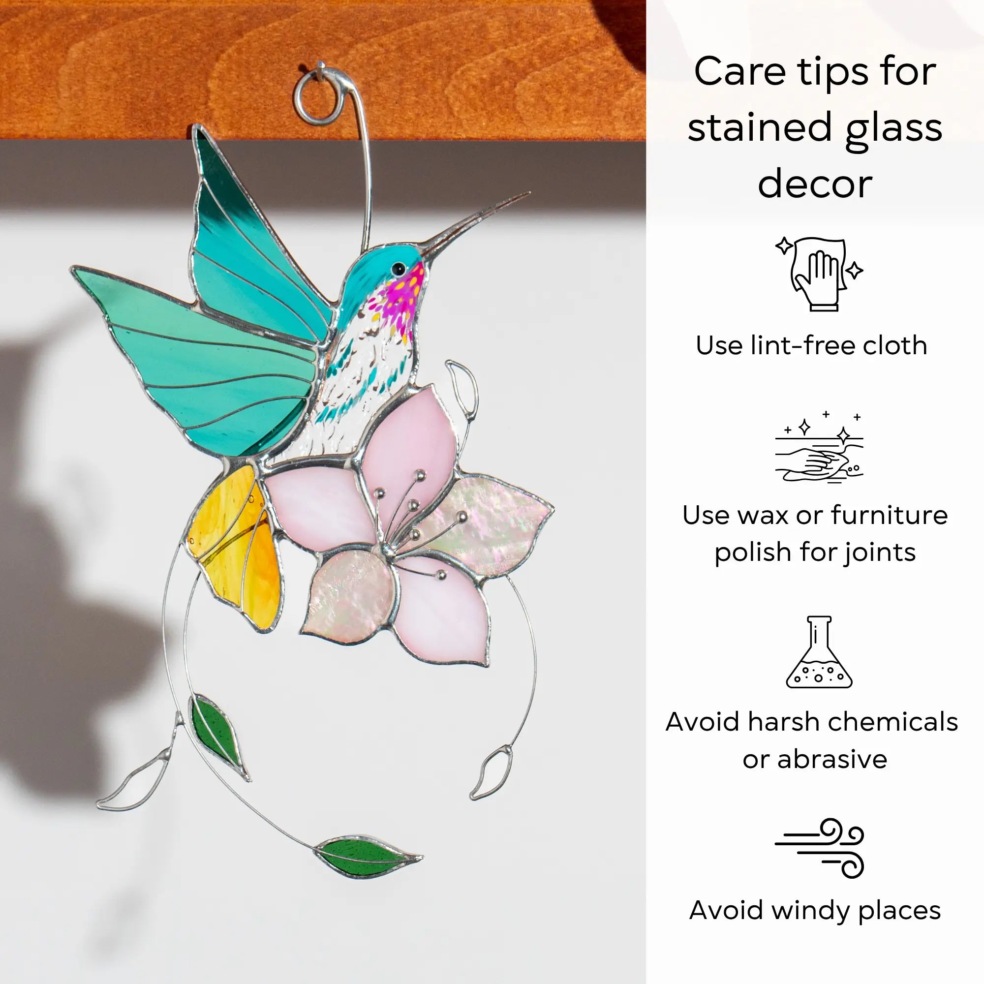 Stained glass hummingbird and flower decor with care tips on a white background: use lint-free cloth, polish joints with car wax or furniture polish, avoid harsh chemicals, and windy places.