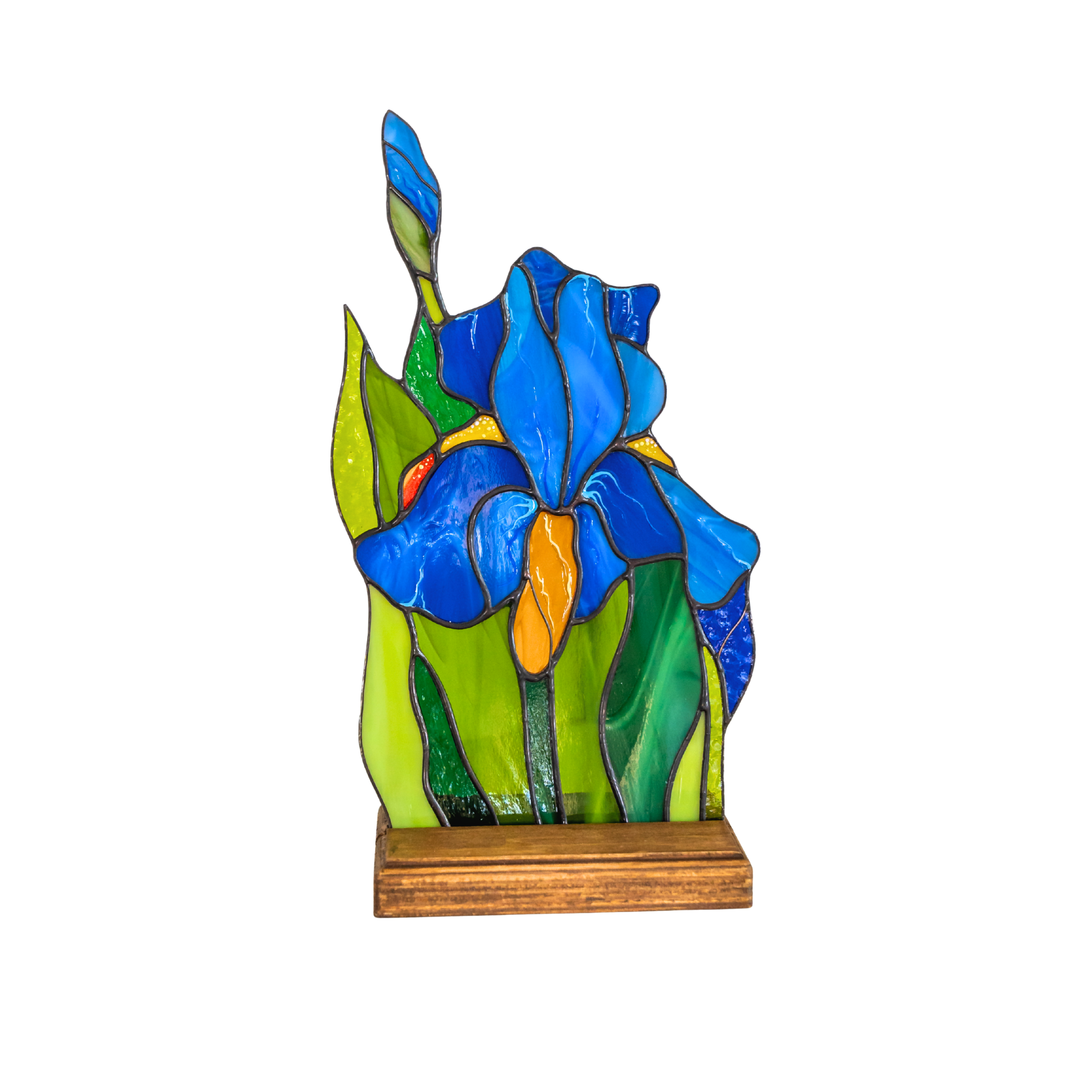 Colorful stained glass iris suncatcher on wooden base, isolated on white background.