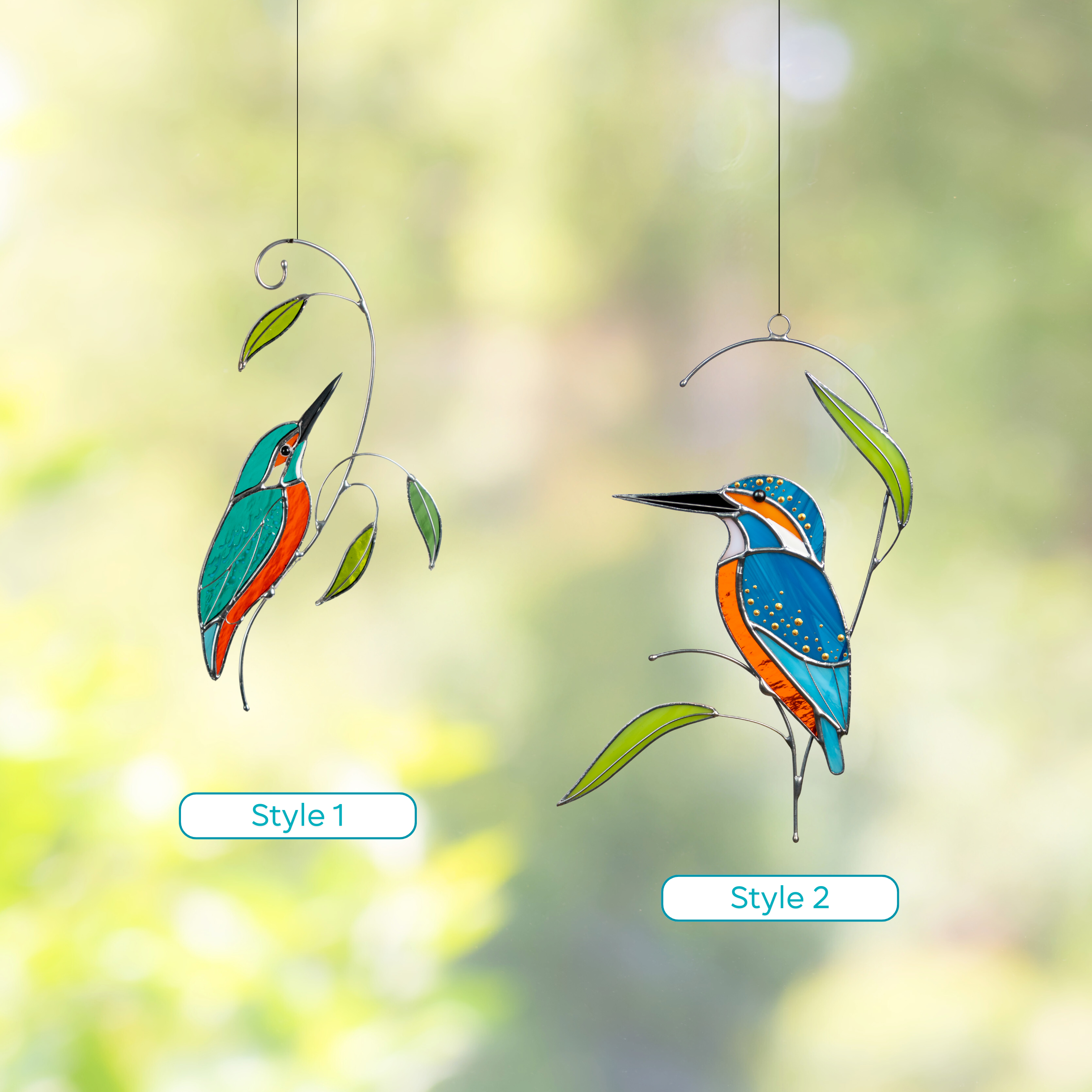 Two stained glass kingfisher suncatchers labeled Style 1 and Style 2, with vivid colored glass and leaves.