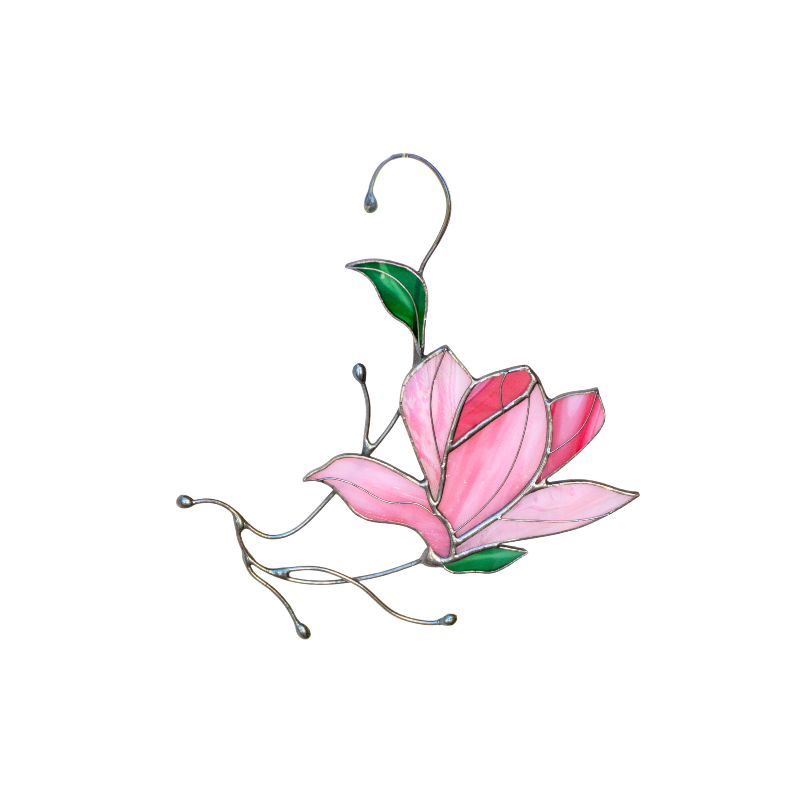 Stained glass pink magnolia with green leaves on white background, showcasing its graceful, curving form.