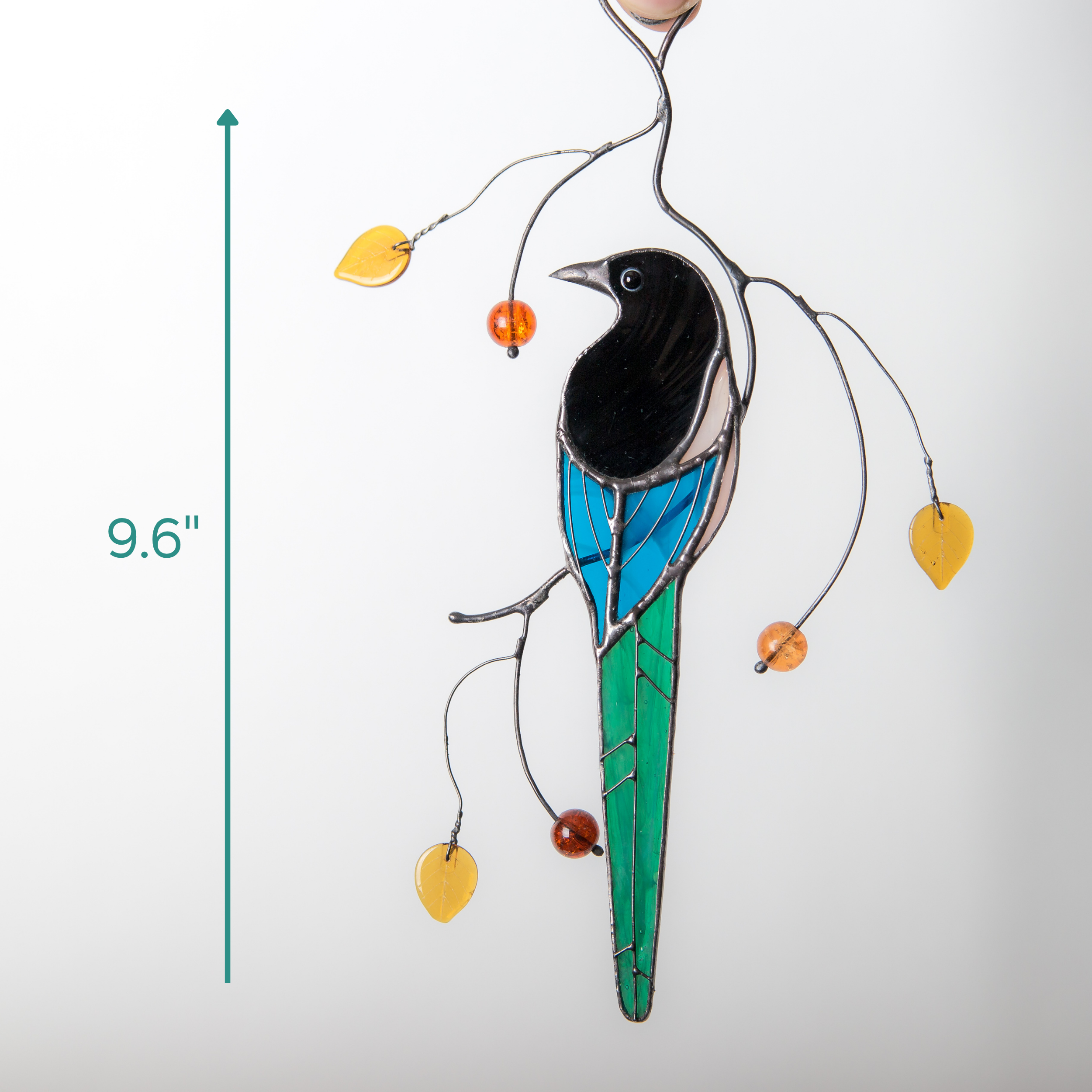 Measurement view of a 9.6-inch stained glass magpie with golden leaves and amber beads.