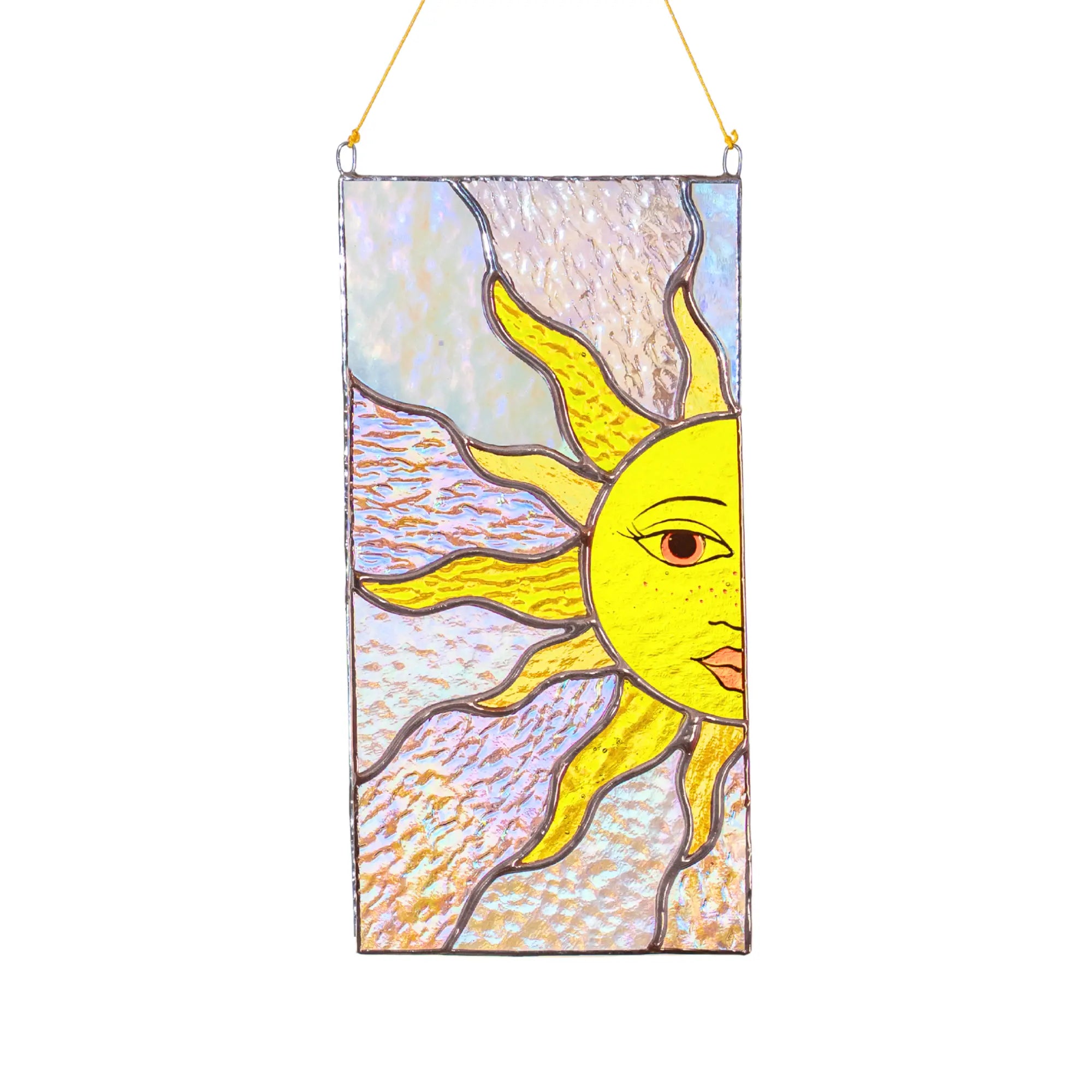 Stained glass panel featuring sun with rays design on a white background