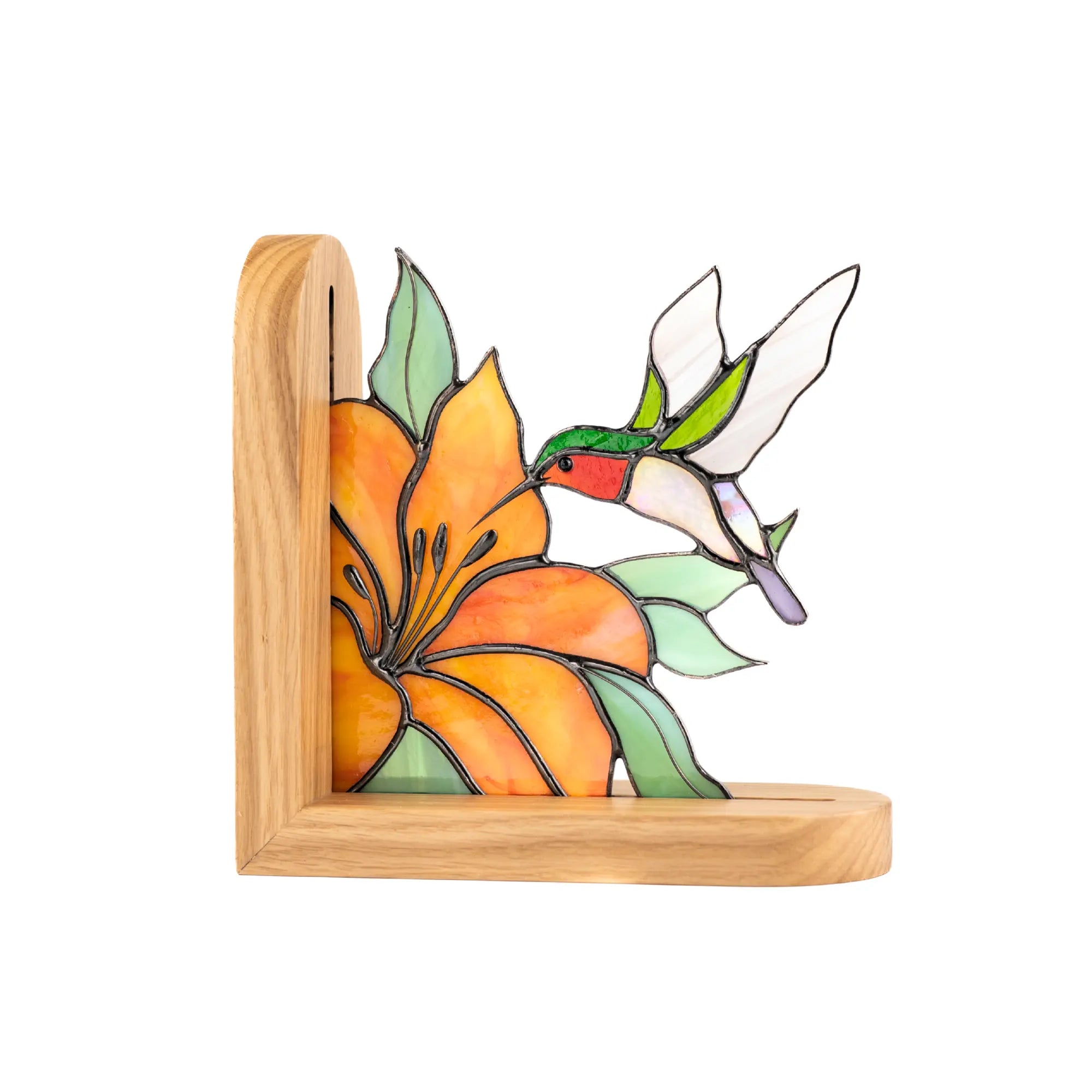 Stained glass bookend with a hummingbird and flower design on a wooden base.