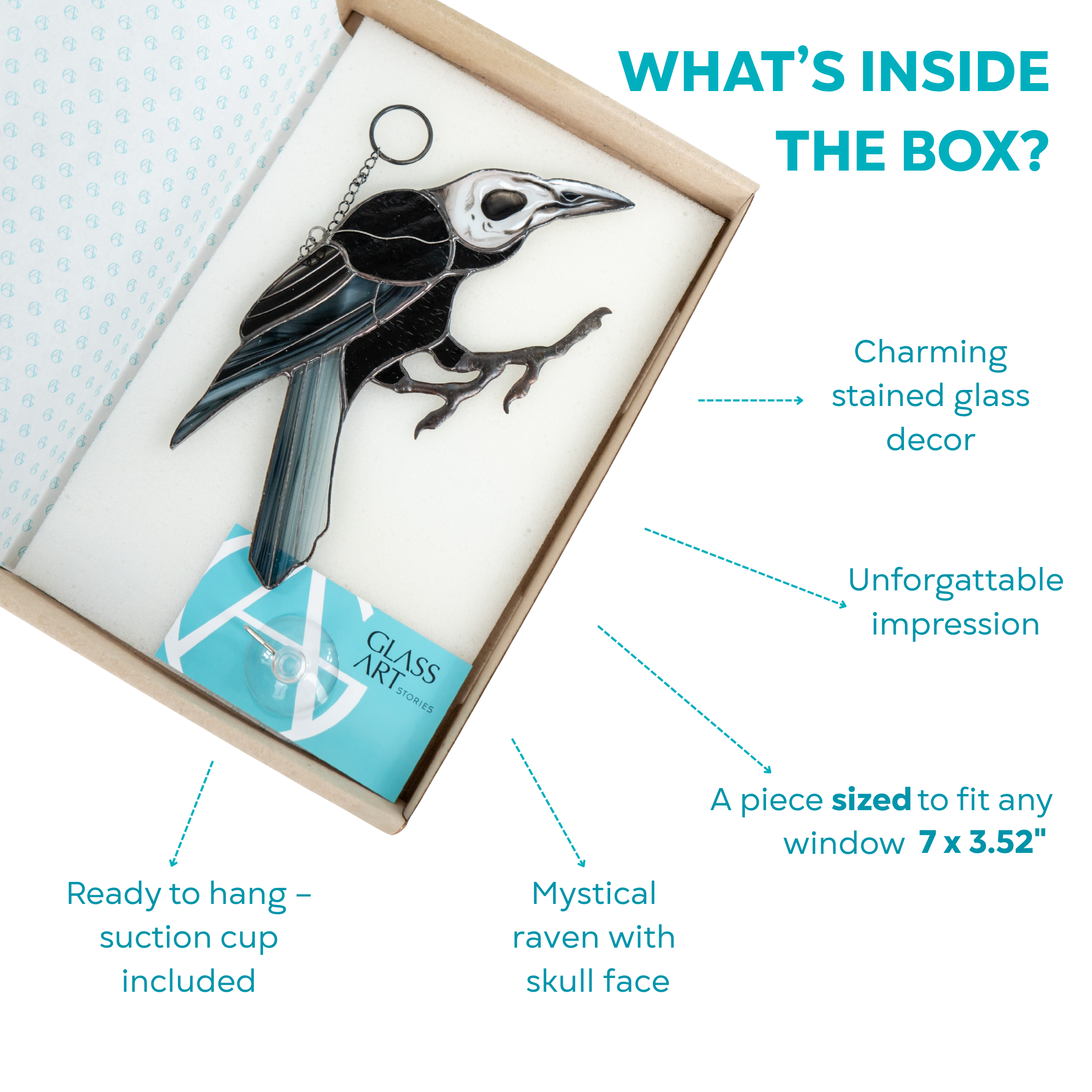 Stained glass raven with white skull head resting in branded box with a suction cup and kraft packaging.
