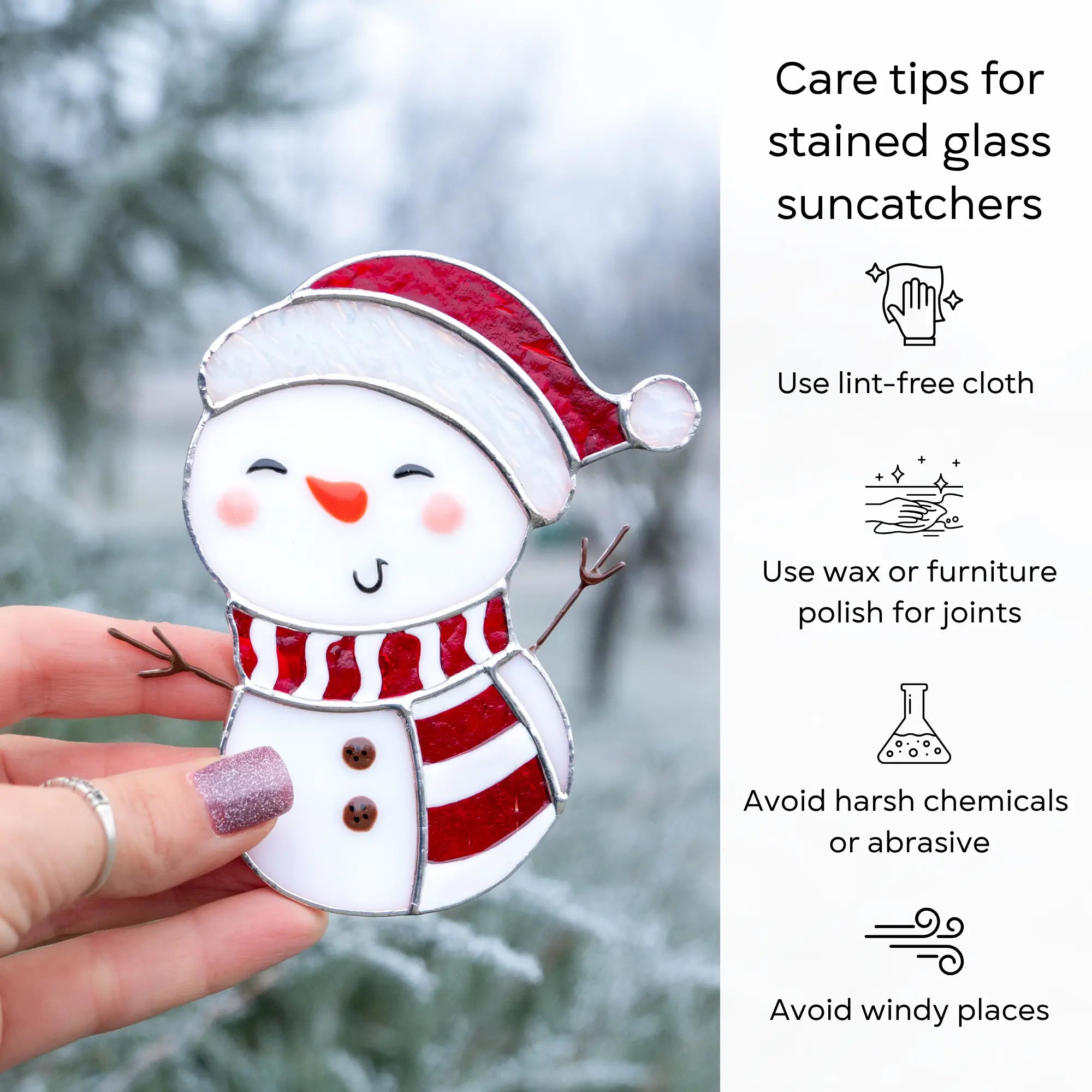 Stained glass suncatcher snowman ornament held by a hand with care tips on the right: use lint-free cloth, polish joints with car wax or furniture polish, avoid harsh chemicals, and windy places.