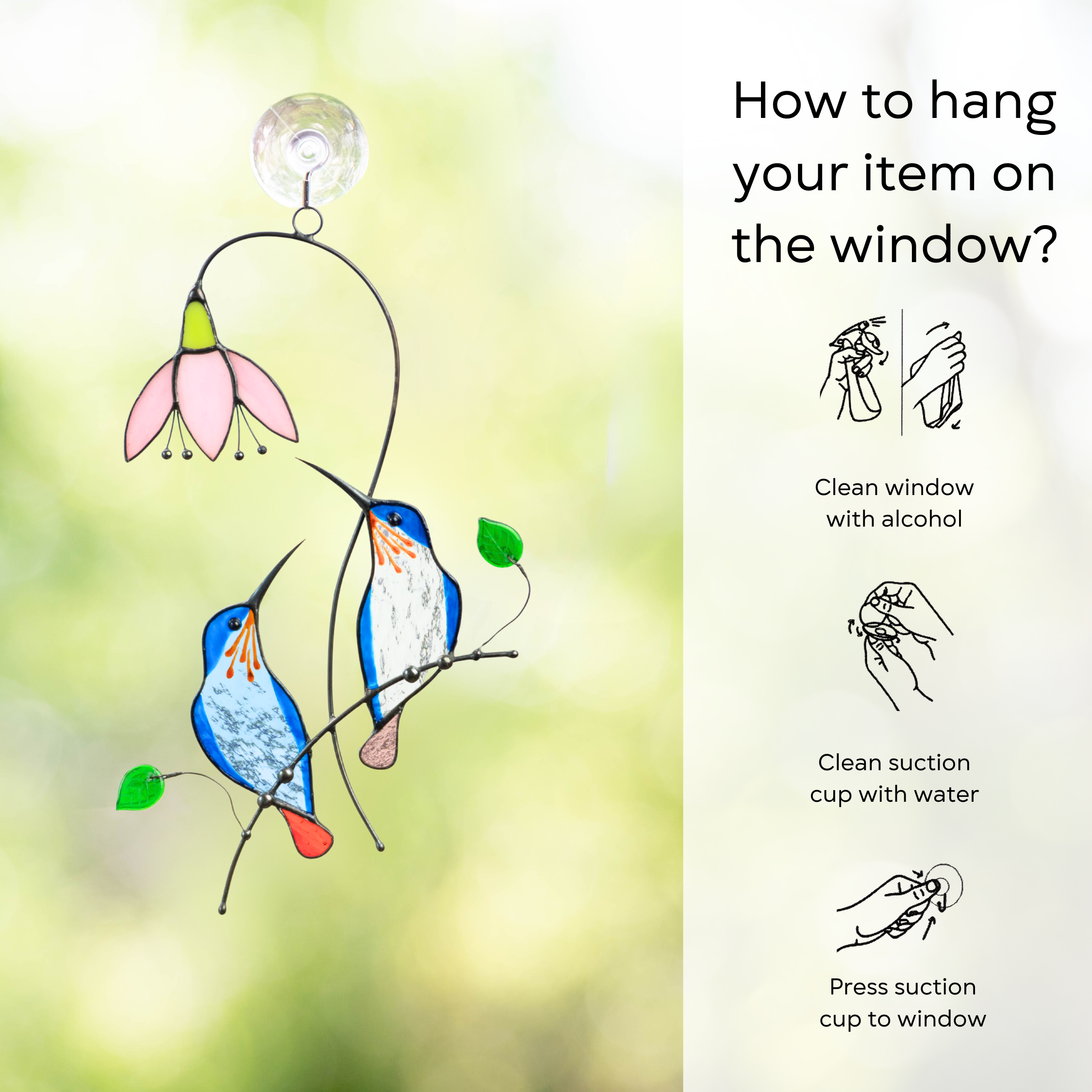 Pair of blue stained glass suncatcher hanging on the window with hanging instructions beside: clean window and suction cup, press a cup to the surface
