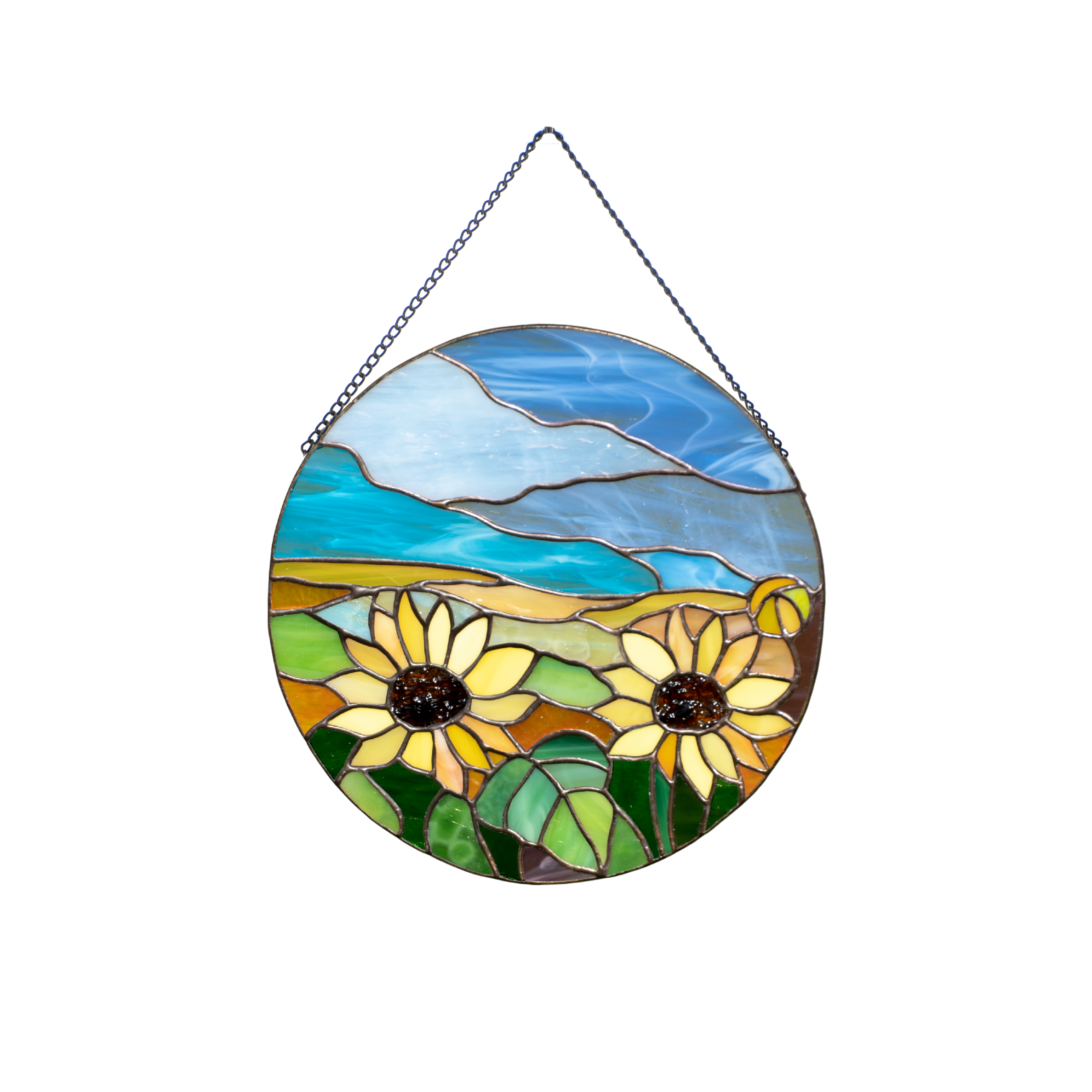 Stained glass panel featuring warm yellow sunflowers with bright blue sky on the background