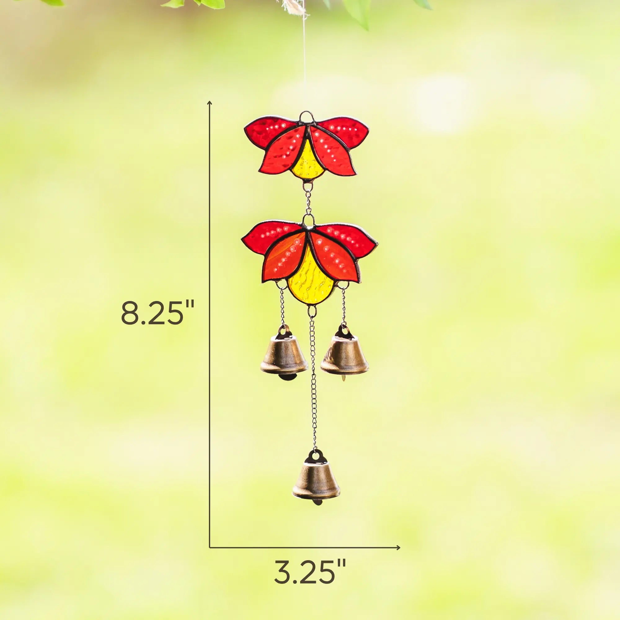Stained glass wind chime featuring red and yellow flower shapes and three small hanging brass bells, with dimensions 8.25 x 3.25 inches