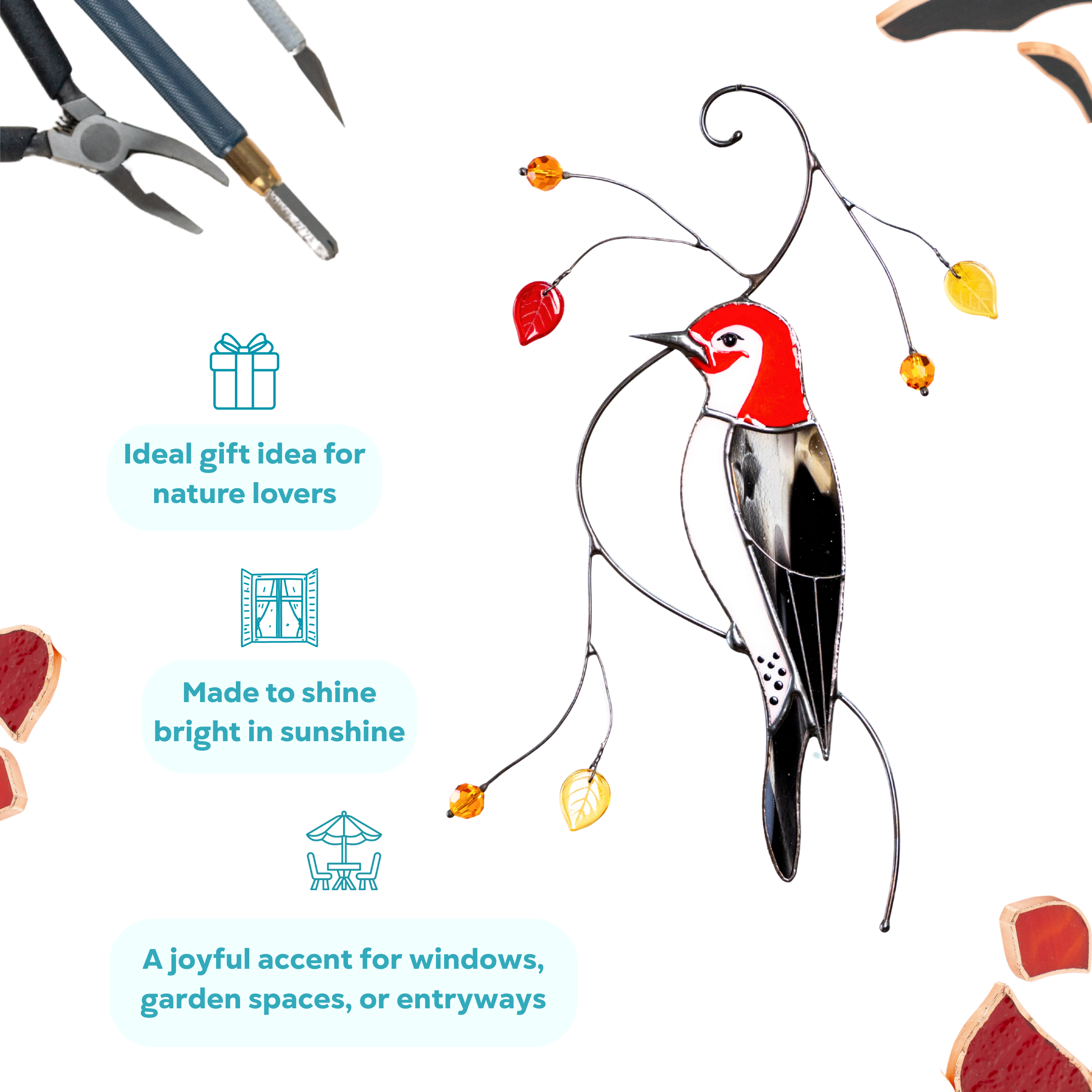 Stained glass woodpecker suncatcher with red head and yellow leaves, styled on a white background with tools.