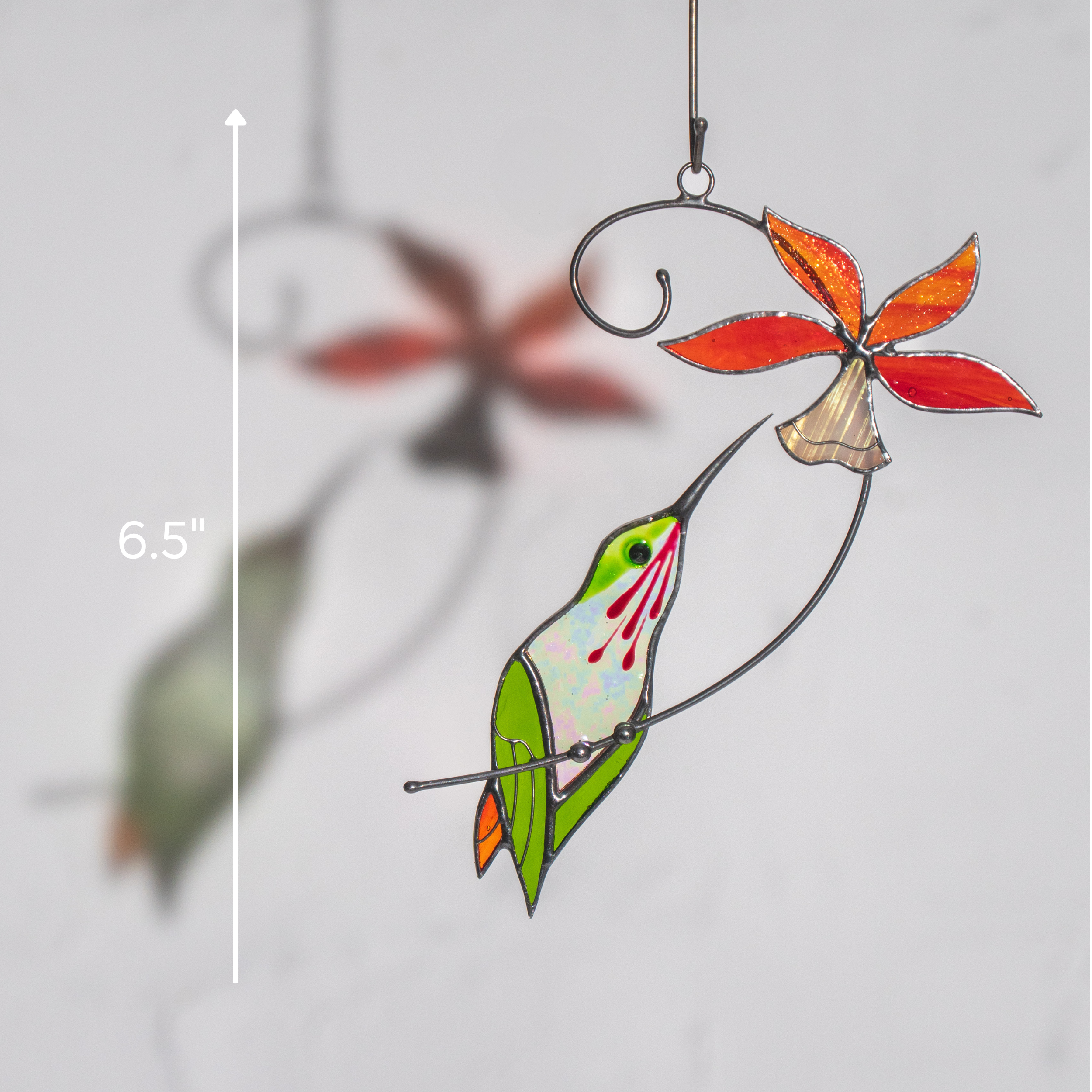 Size guide image featuring stained glass hummingbird and red bell flower with a 6.5" height mark.