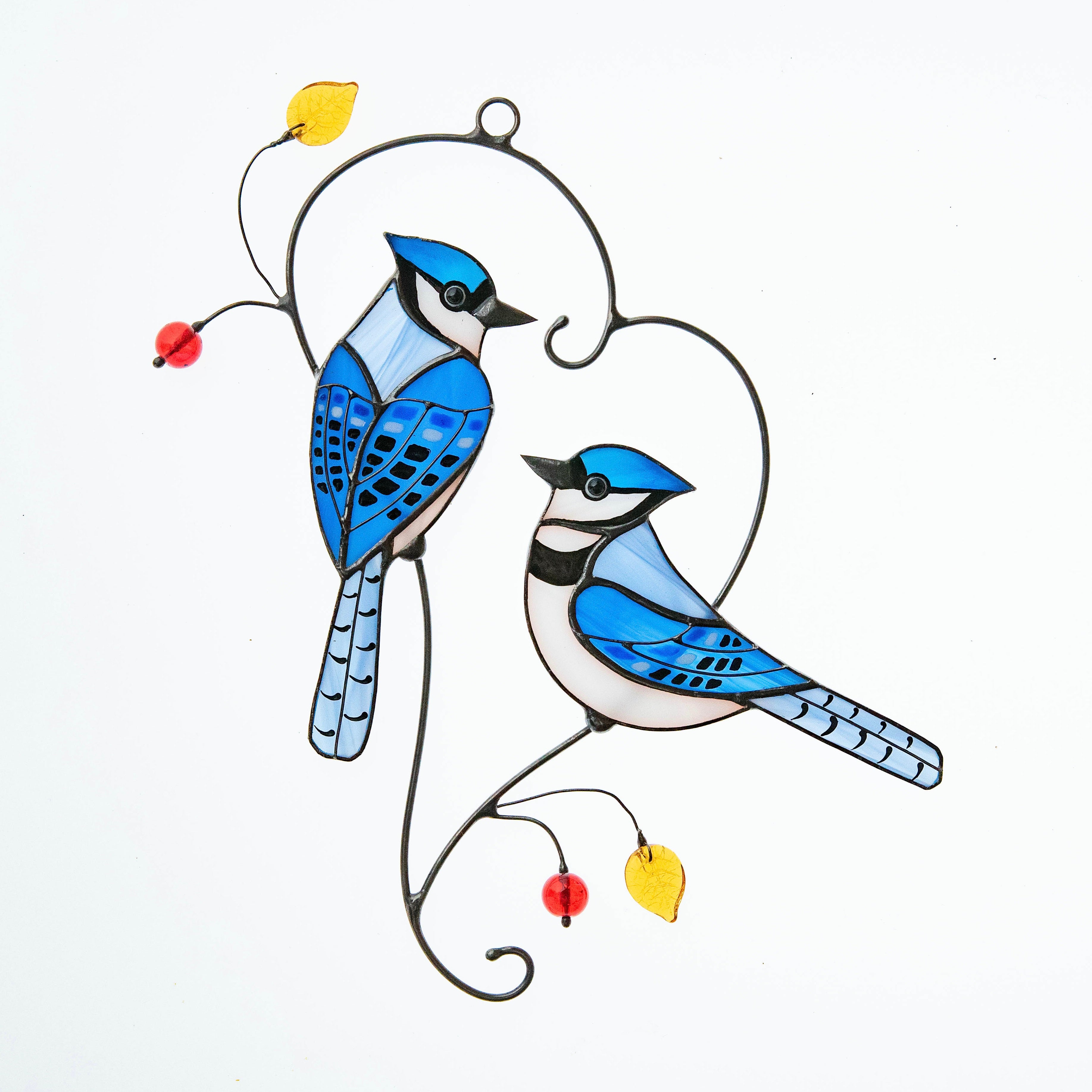 Sitting on the branch bluejays window hanging of stained glass