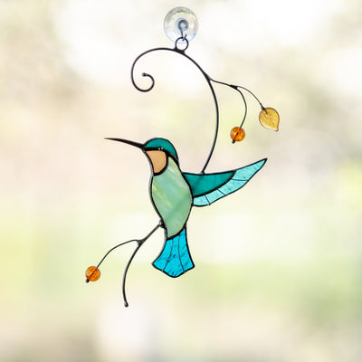 Stained glass hummingbird taking off the branch suncatcher