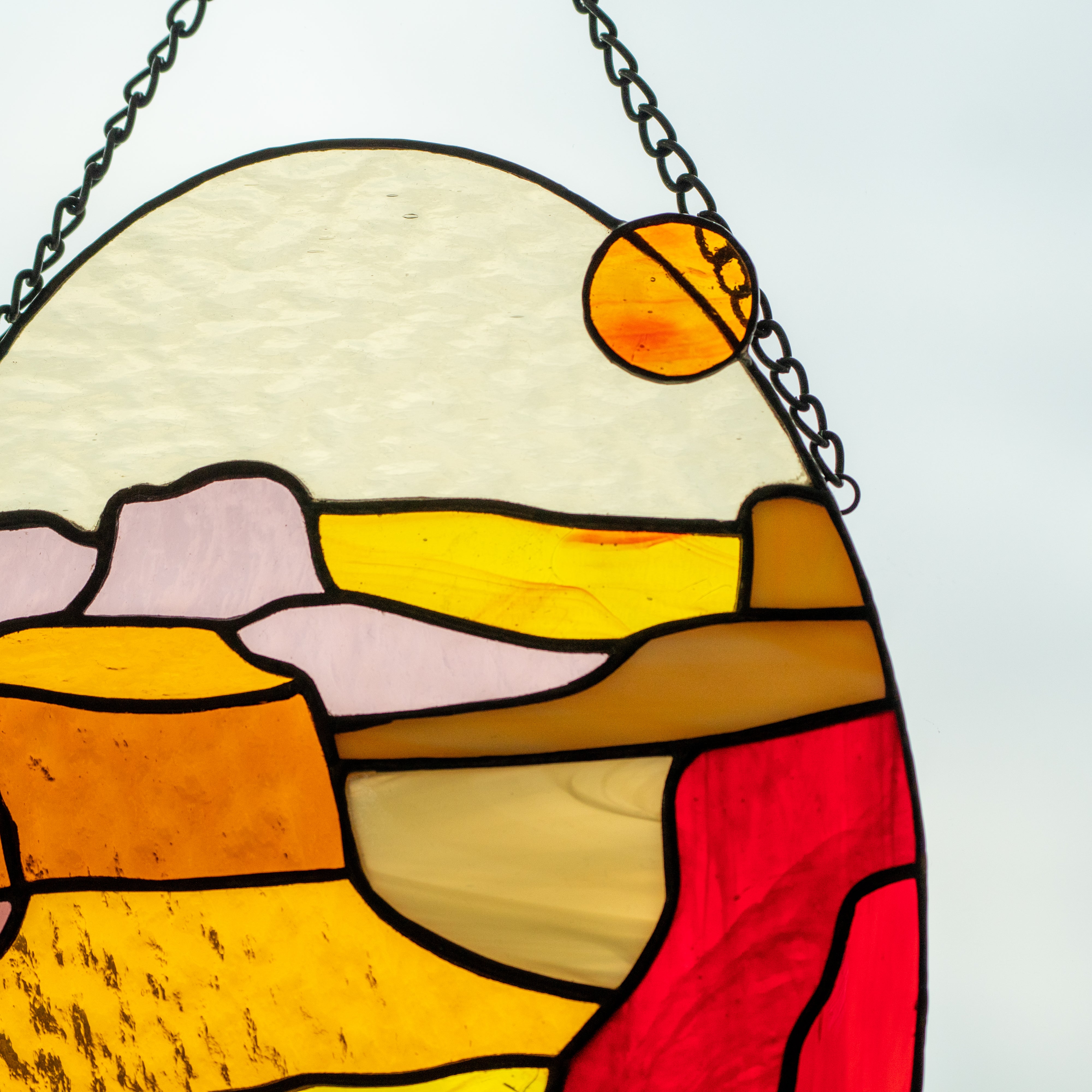 Zoomed stained glass setting sun in Arizona