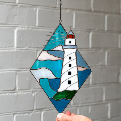 Lighthouse panel of stained glass for window