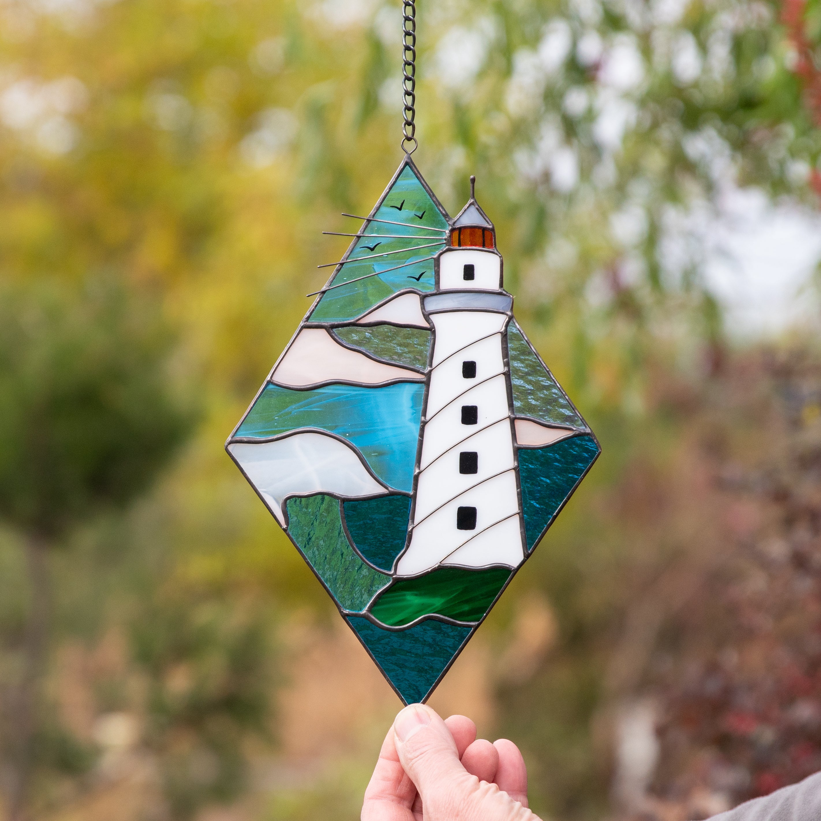 Stained glass lighthouse window hanging panel