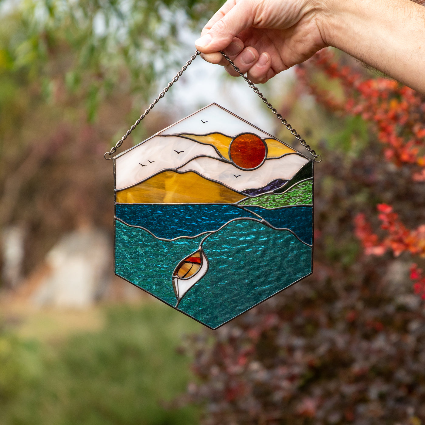 The waters and the boat stained glass panel for window decor