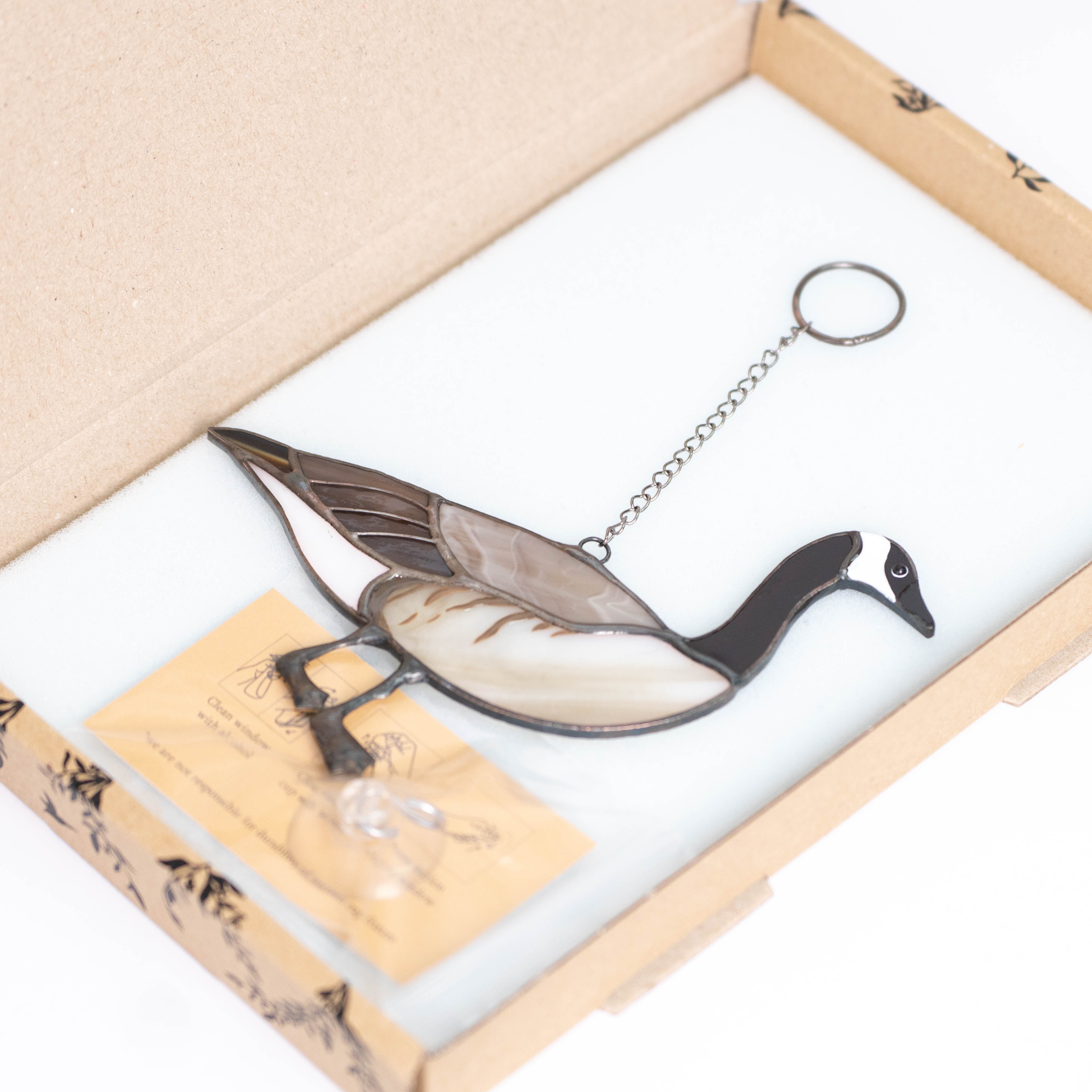 Stained glass Canadian goose window hanging in a brand box