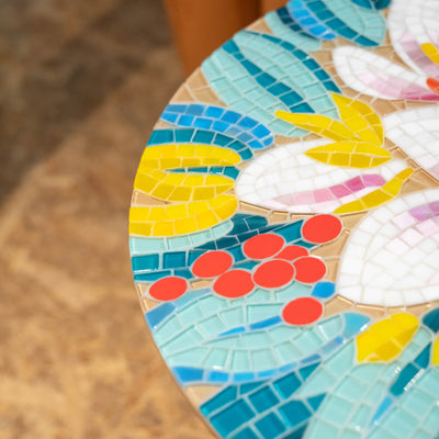 Zoomed stained glass  mosaic table with white and pink flowers