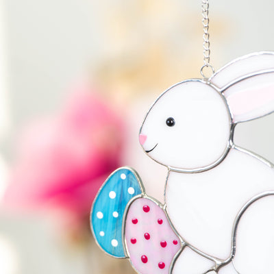 Zoomed stained glass Easter bunny with two eggs suncatcher