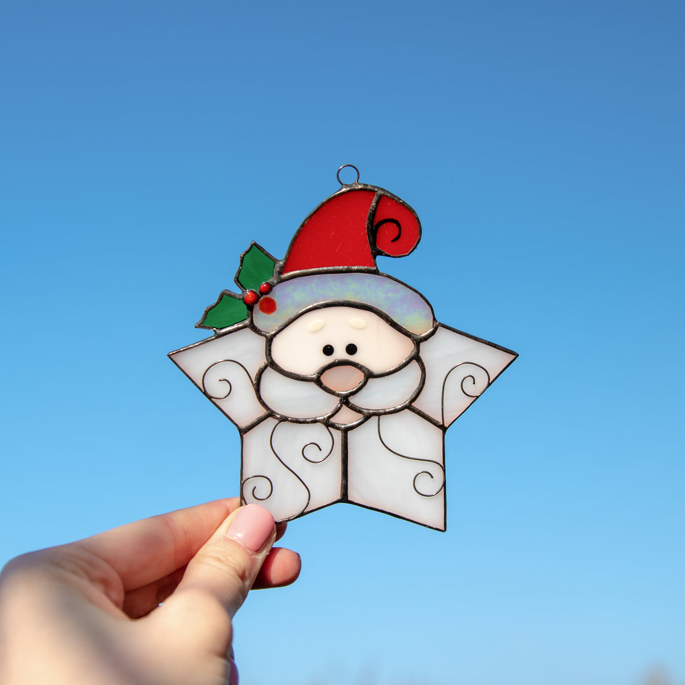 Cute stained glass Santa shaped as a snowflake window hanging