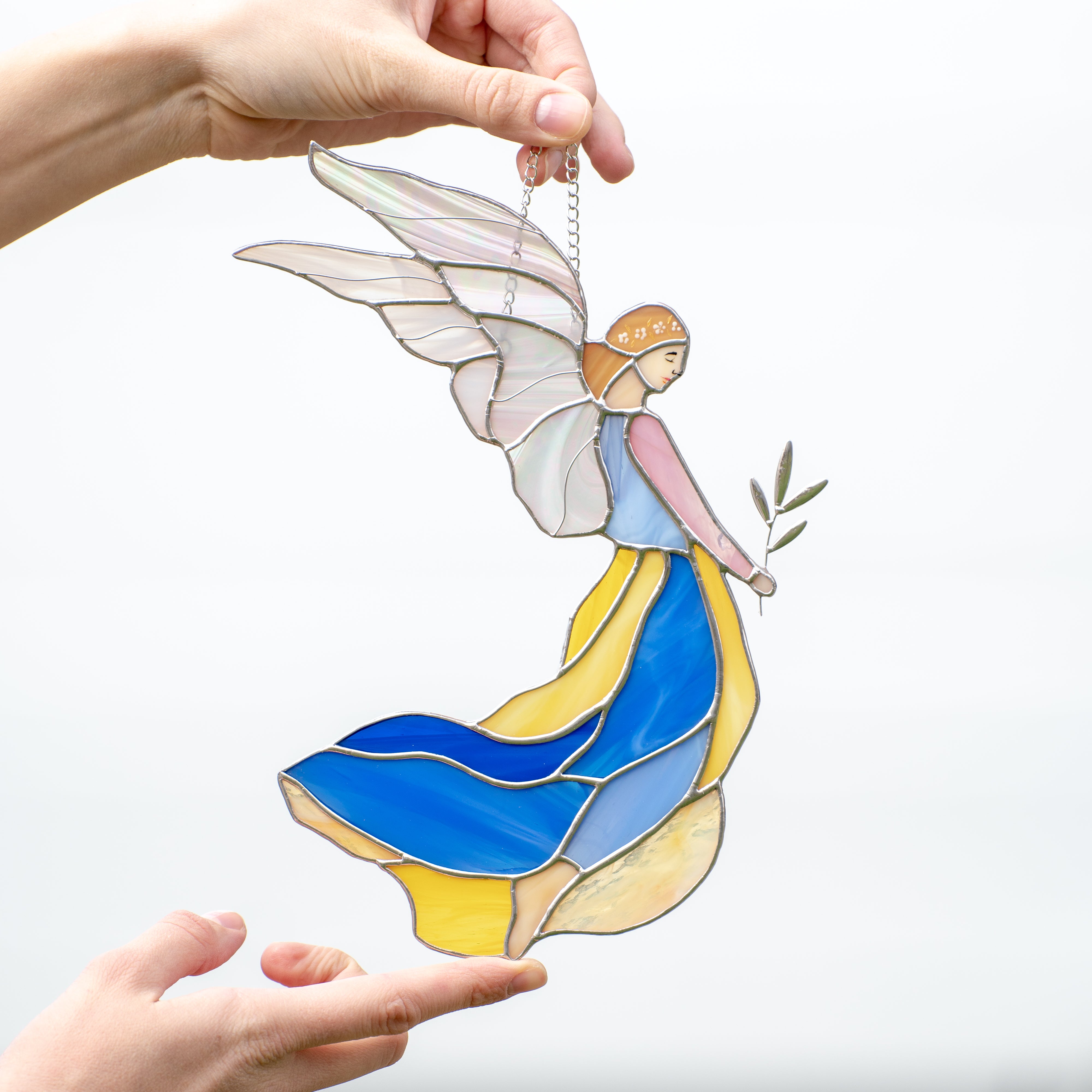 Stained glass girl guardian angel with iridescent wings window hanging