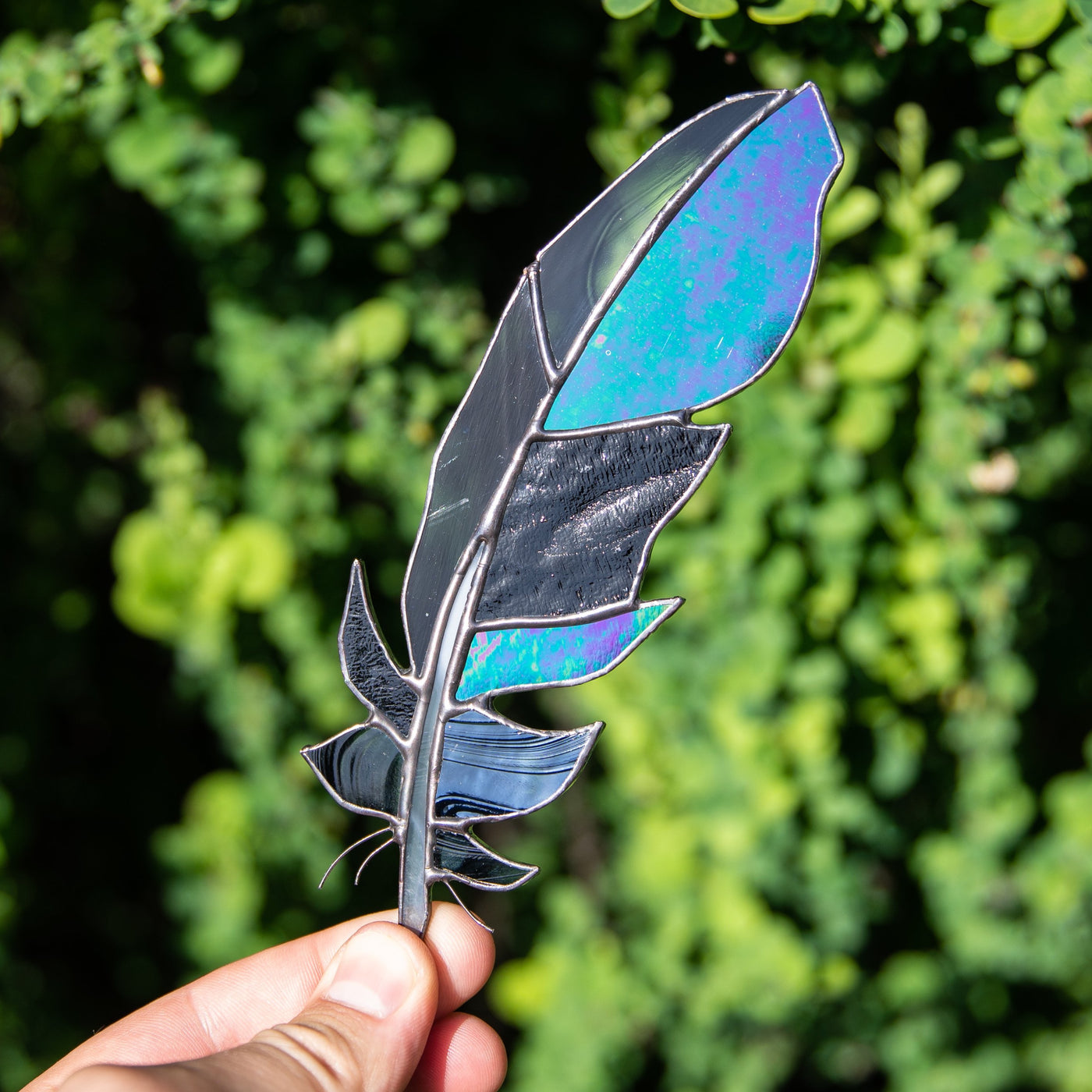Stained glass raven feather suncatcher with modulating parts for window decoration