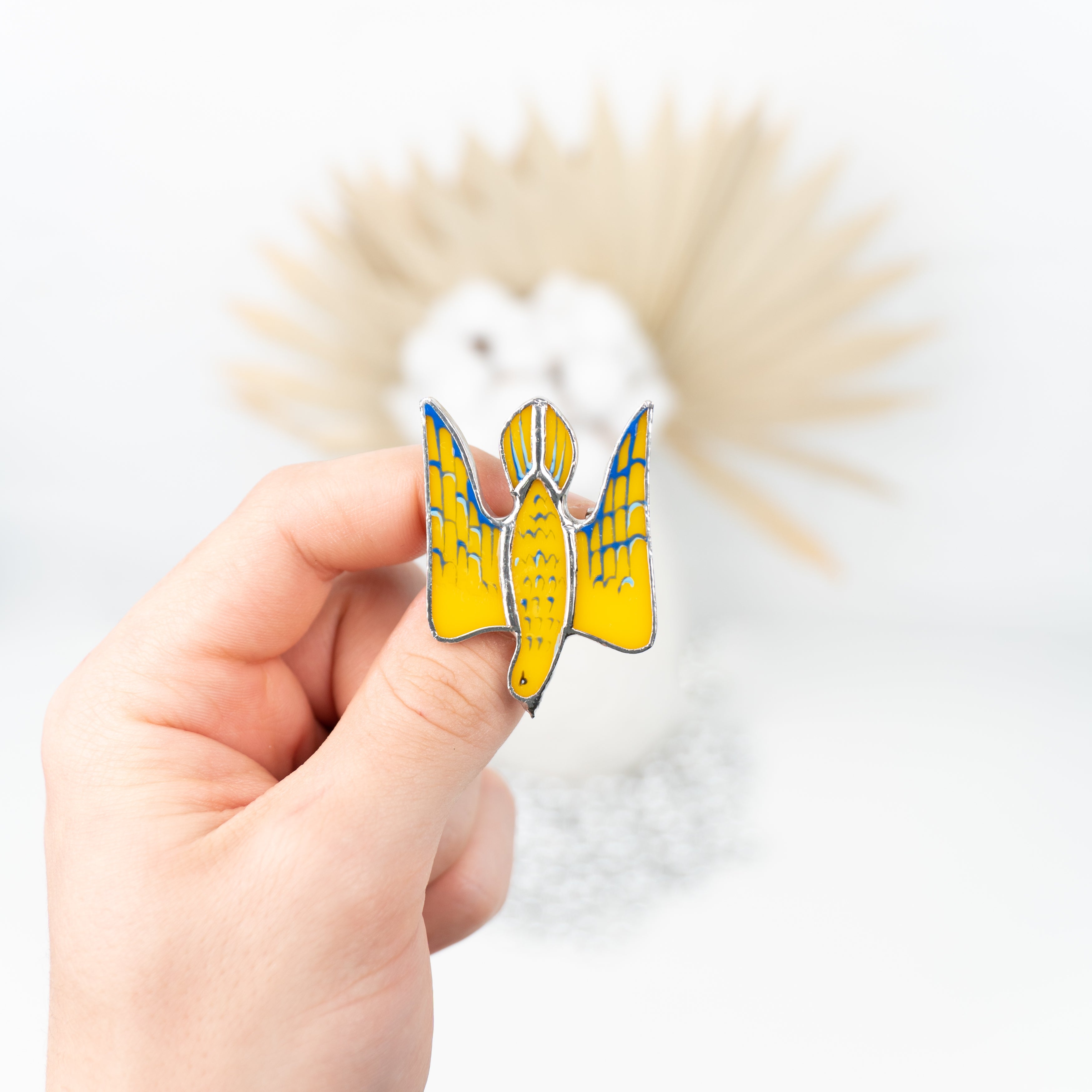 Ukrainian colored falcon pin of stained glass