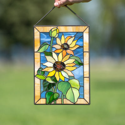 Stained glass window hanging of Ukrainian colouring depicting sunflowers