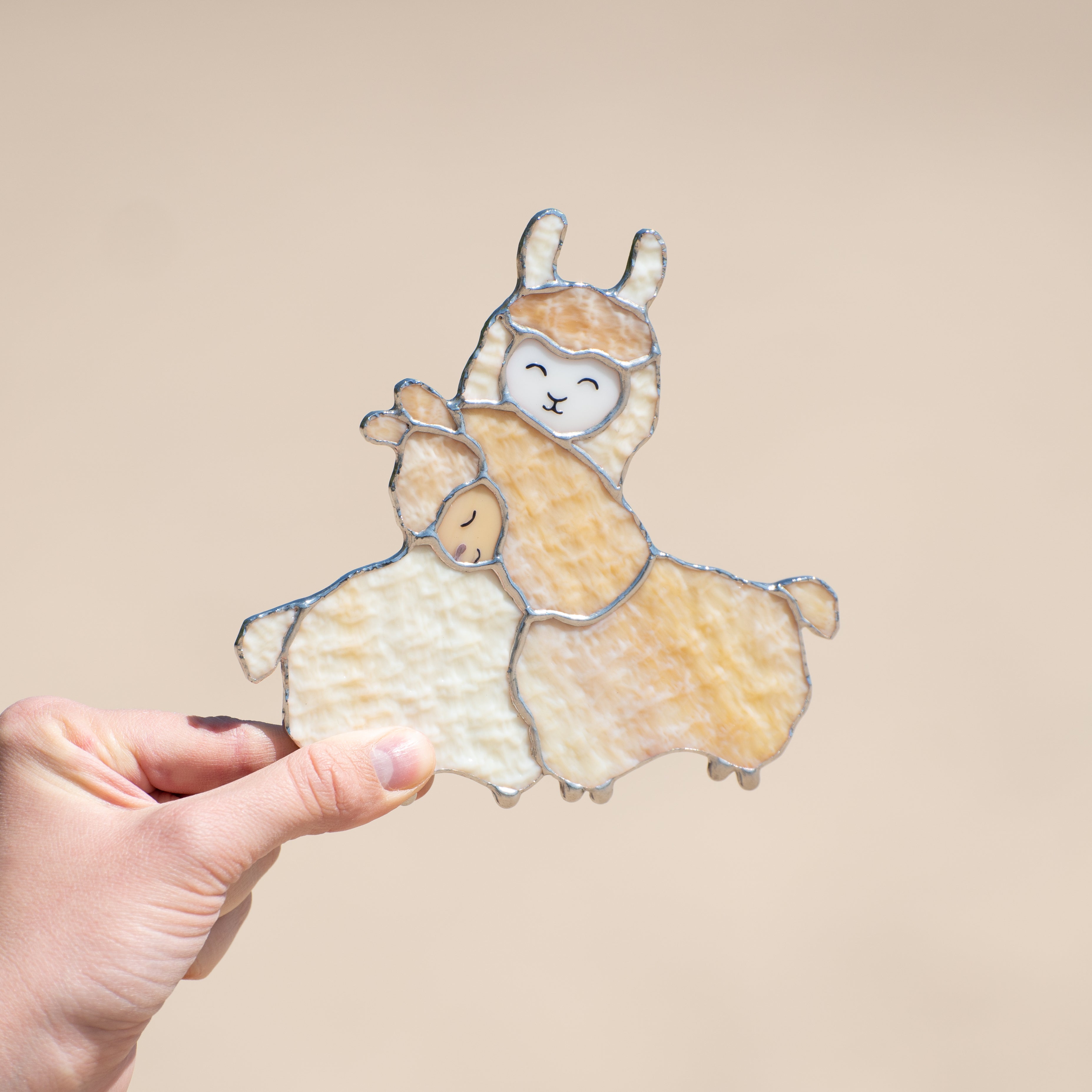 Stained glass cuddling llamas suncatcher for window