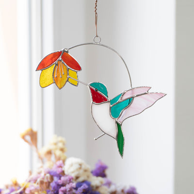 Stained glass hummingbird with flower window hanging