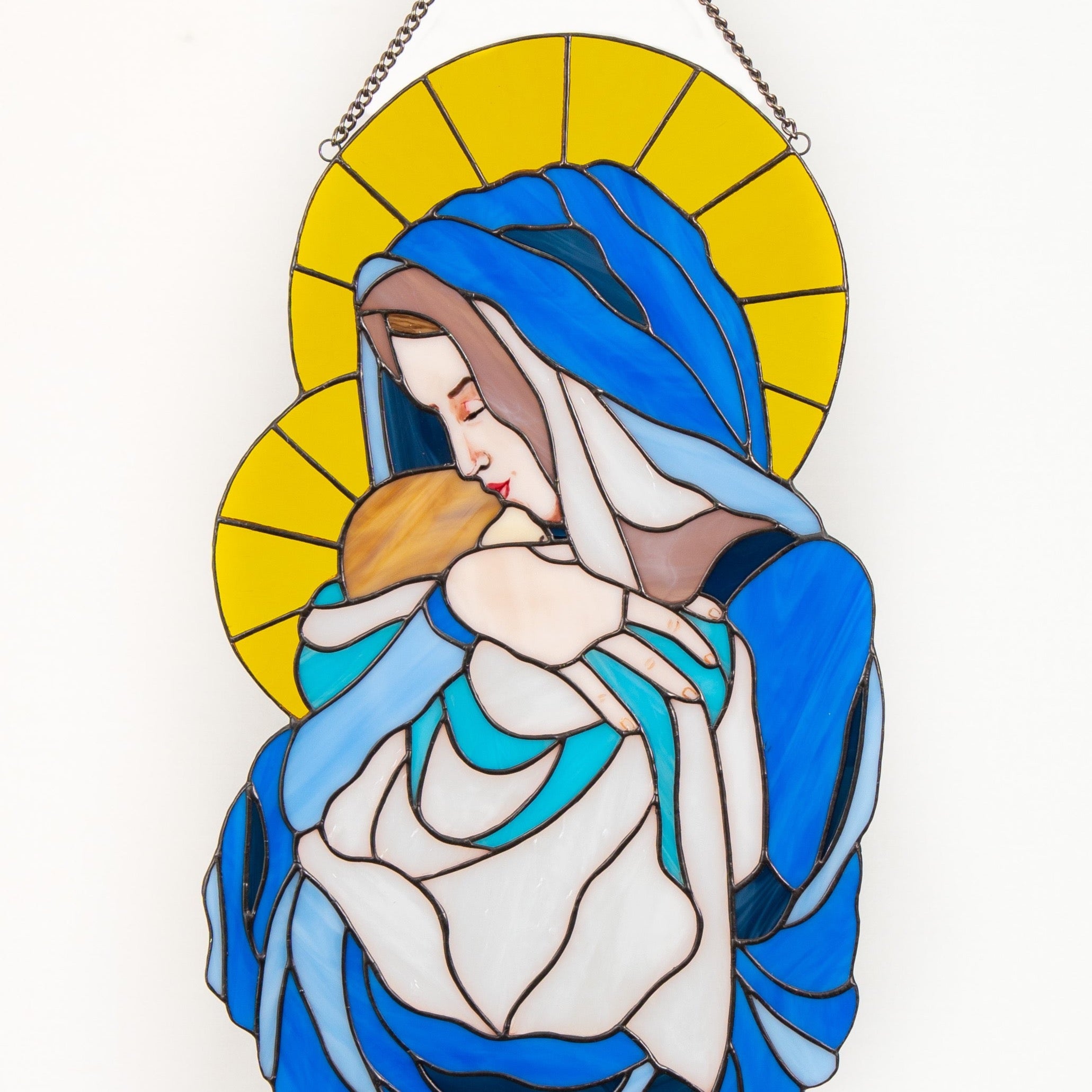 Zoomed stained glass Virgin Mary with Jesus Christ