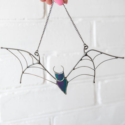 Stained glass Halloween window hanging of iridescent bat