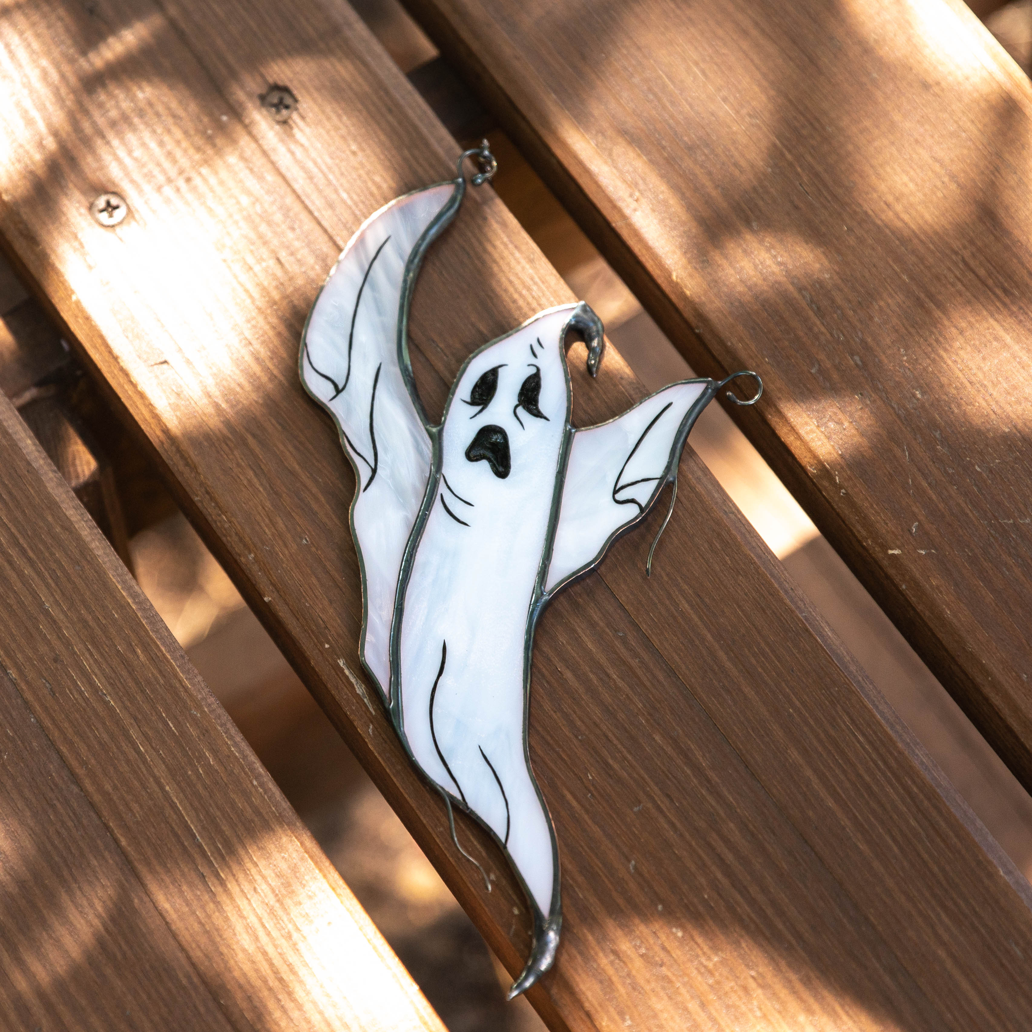 Stained glass suncatcher of flying ghost for Halloween