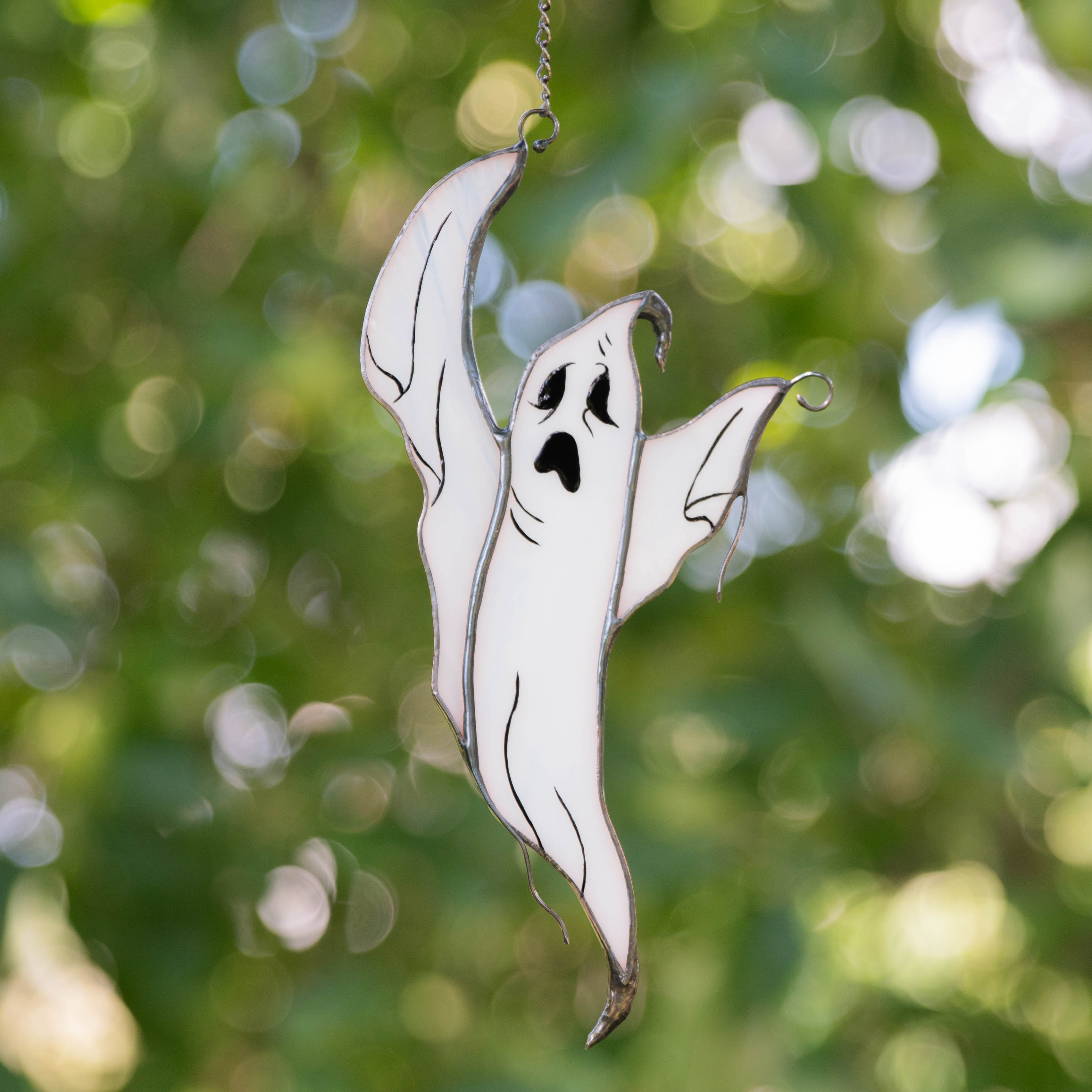 Stained glass flying ghost window hanging