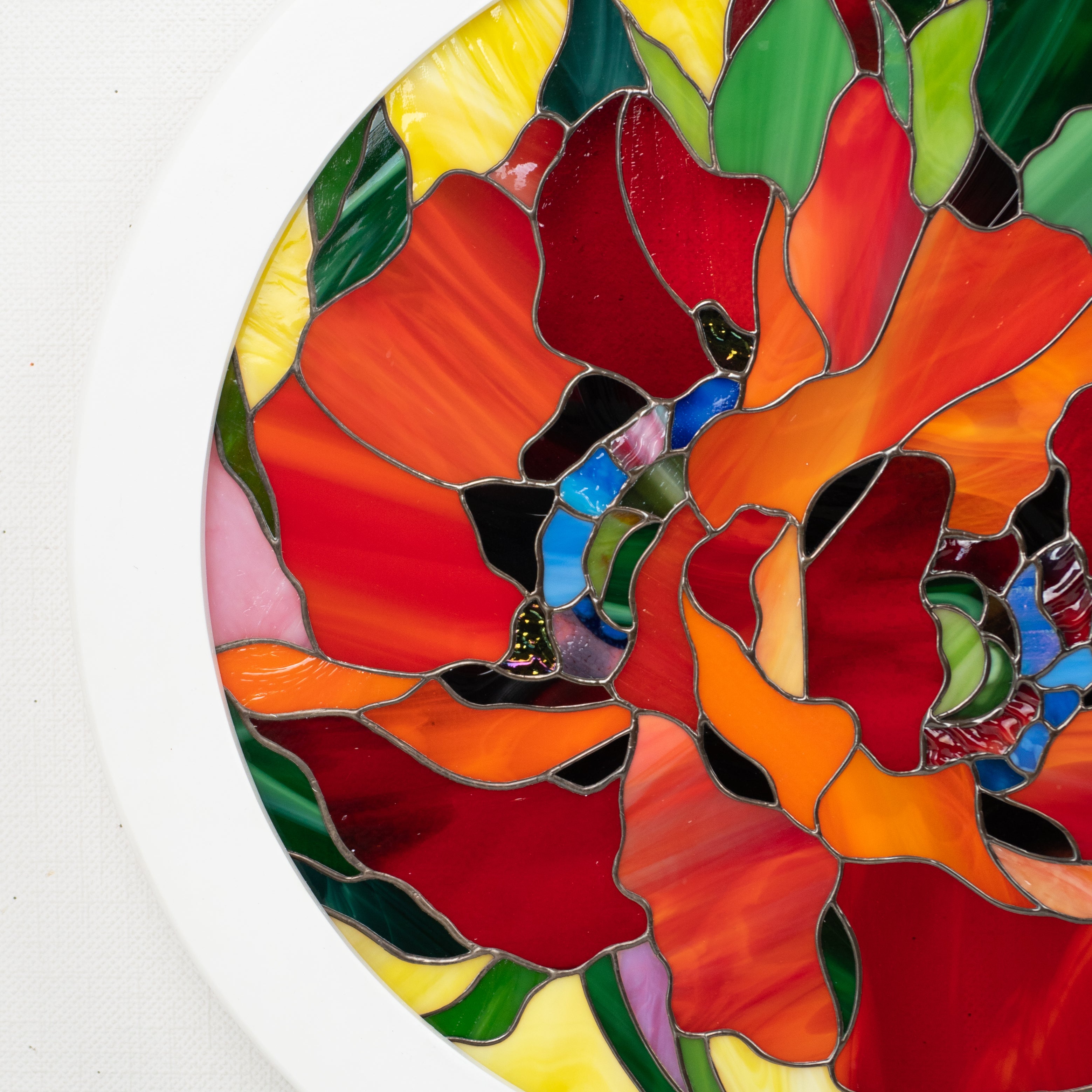 Zoomed stained glass red poppies window hanging