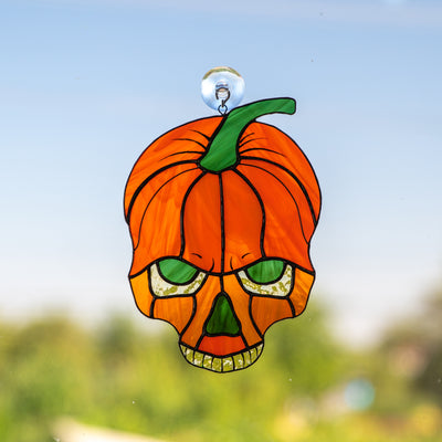 Stained glass pumpkin skull suncatcher for spooky Halloween decor