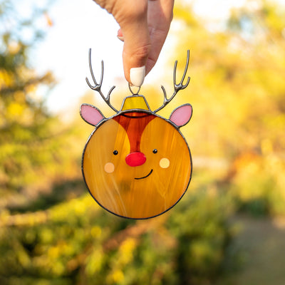 Stained glass Christmas suncatcher of reindeer