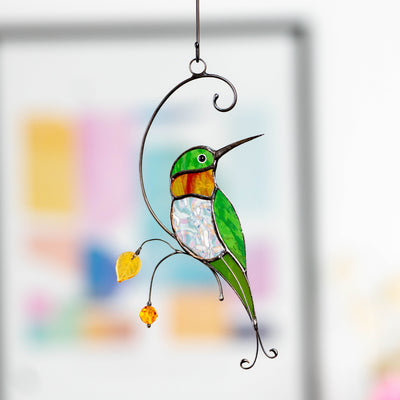 Hummingbird with transparent belly and orange throat suncatcher of stained glass
