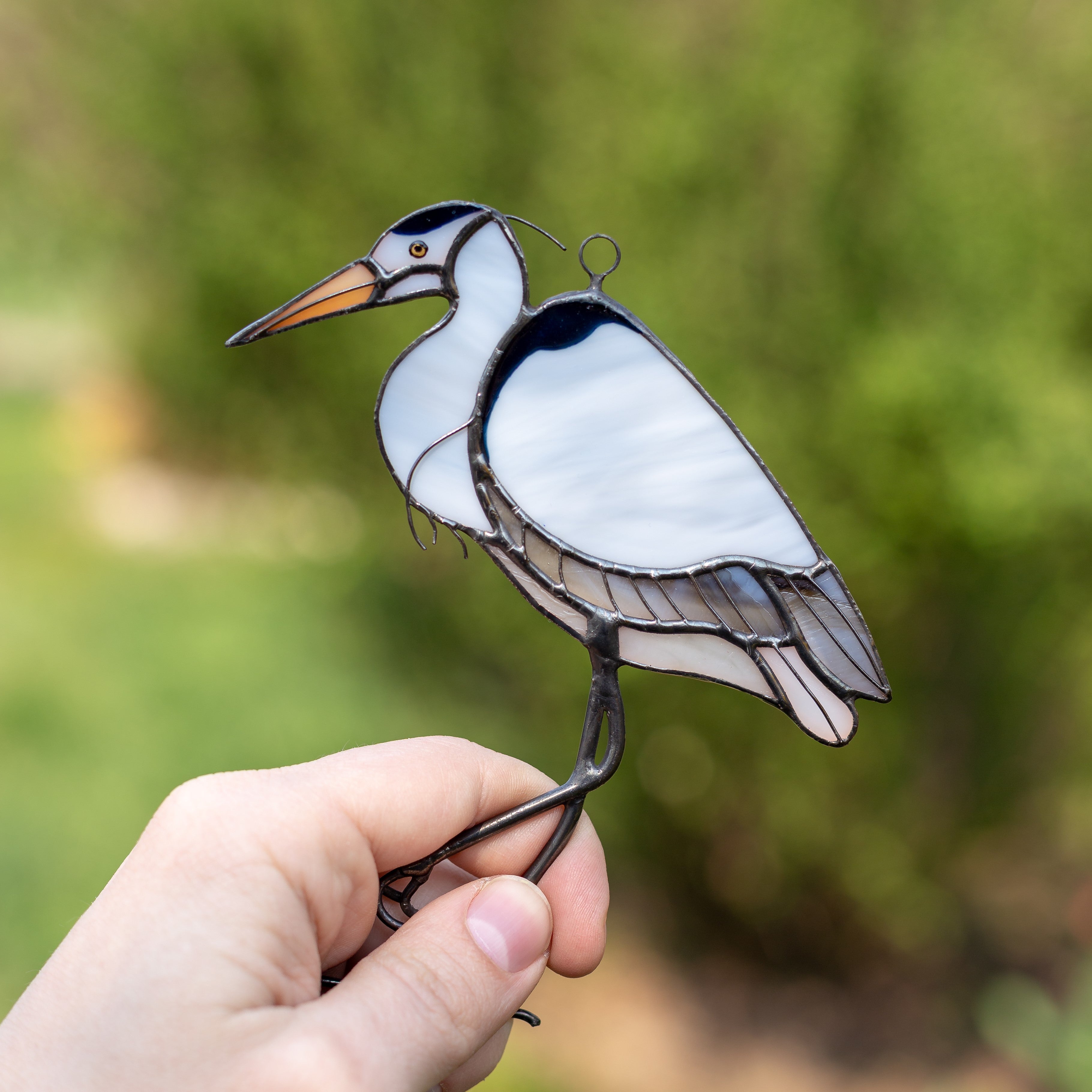 Blue stained glass heron window hanging