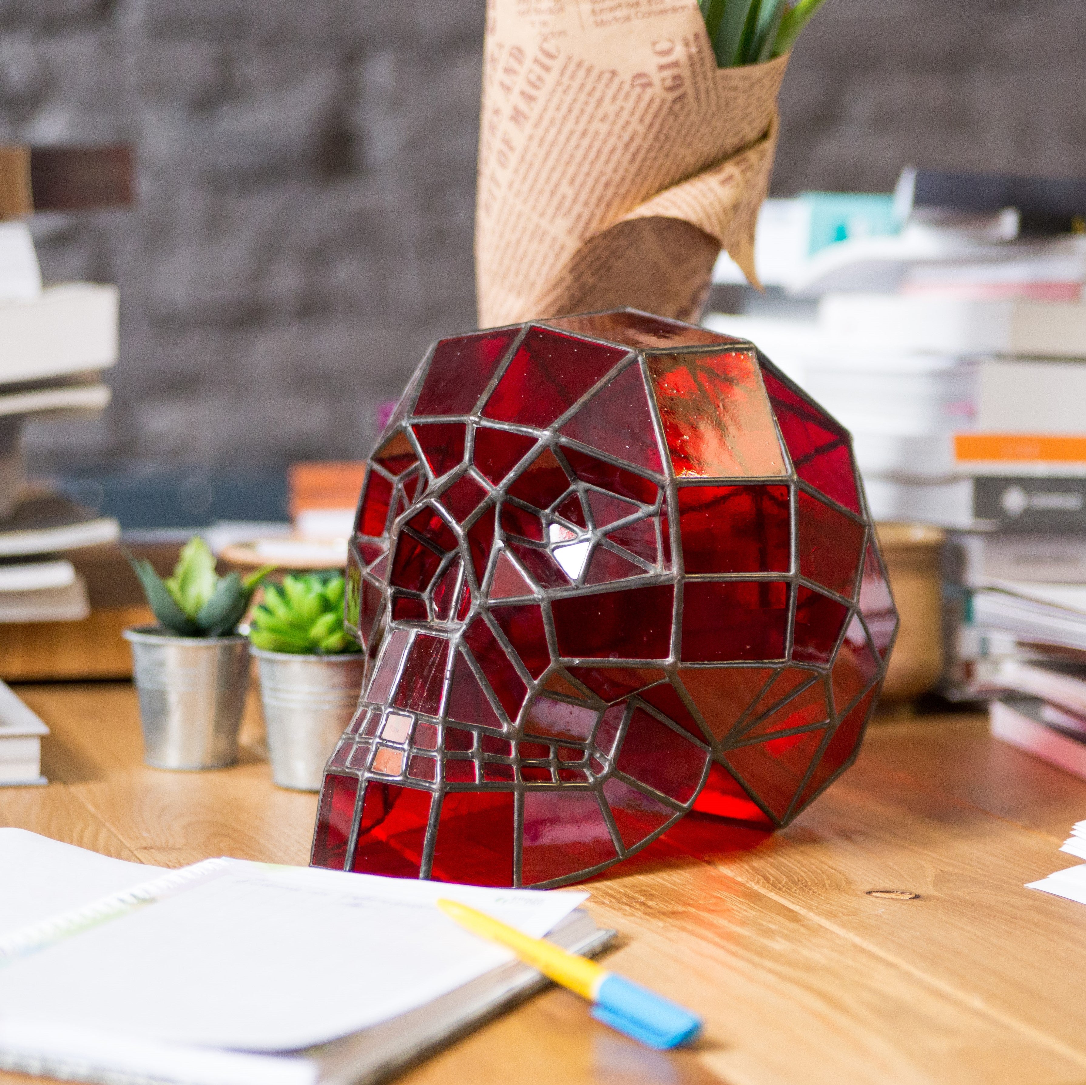 Stained glass 3D human skull of red colour for for Halloween decor