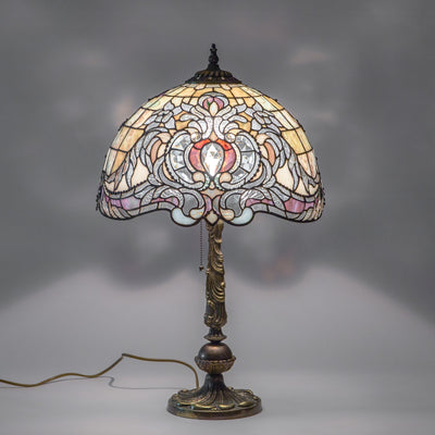 Lit stained glass Tiffany lamp in beige colour with purple markings