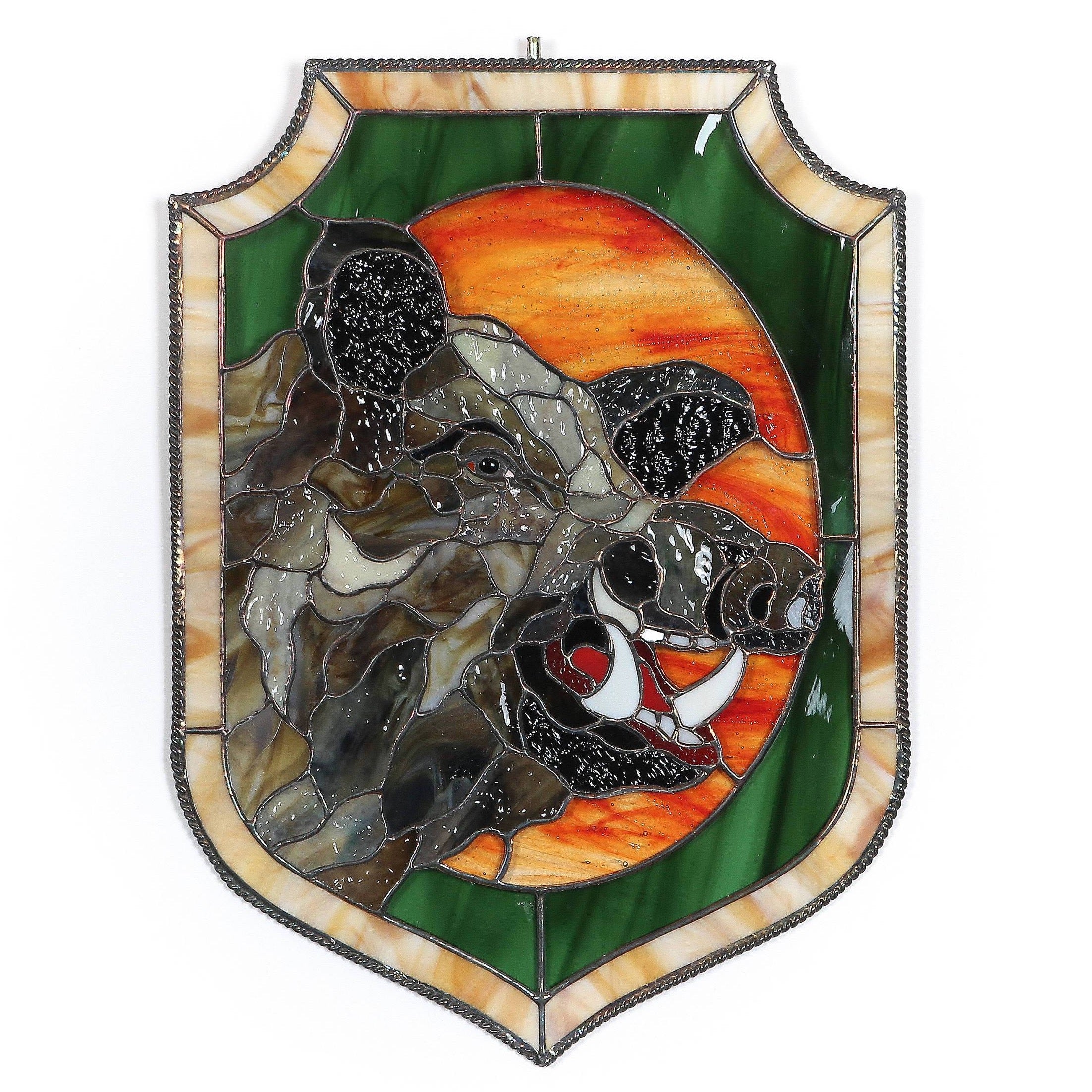 Stained glass boar's head window panel