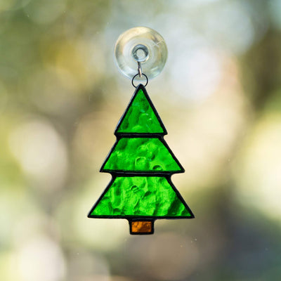 Stained glass suncatcher of a Christmas tree