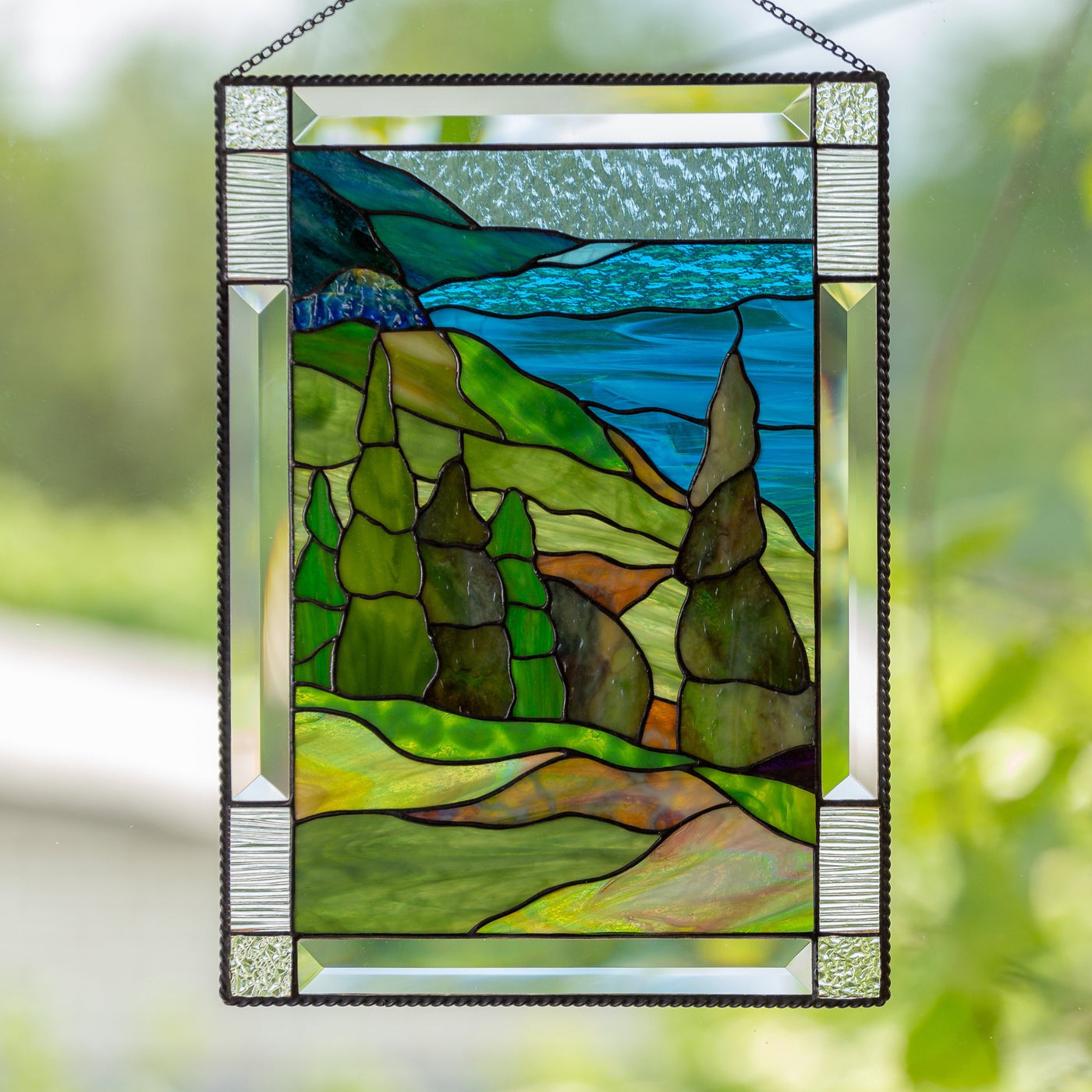 Cape Breton Highlands National Park with its waters and trees stained glass panel 