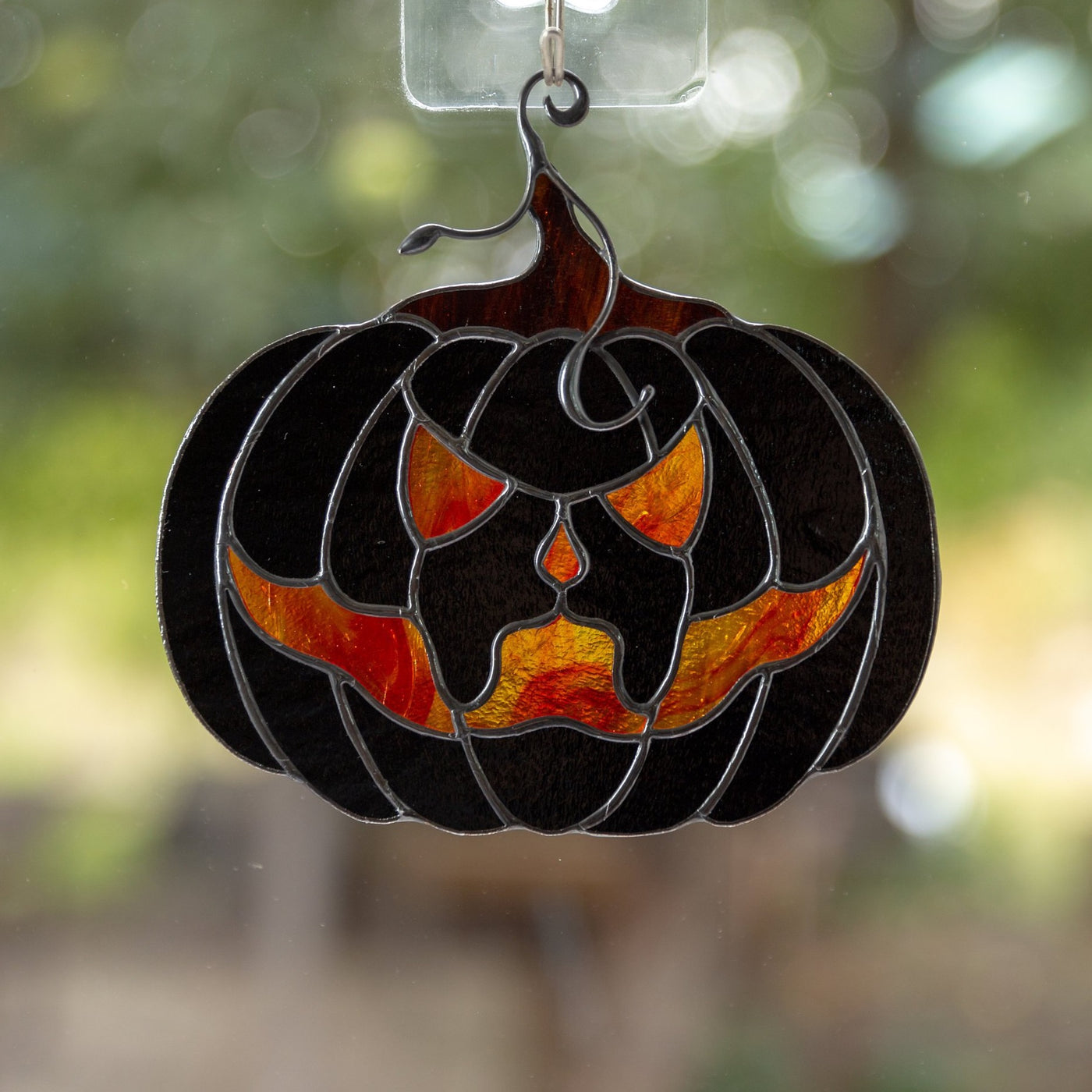 Black pumpkin with creepy face - Halloween stained glass suncatcher